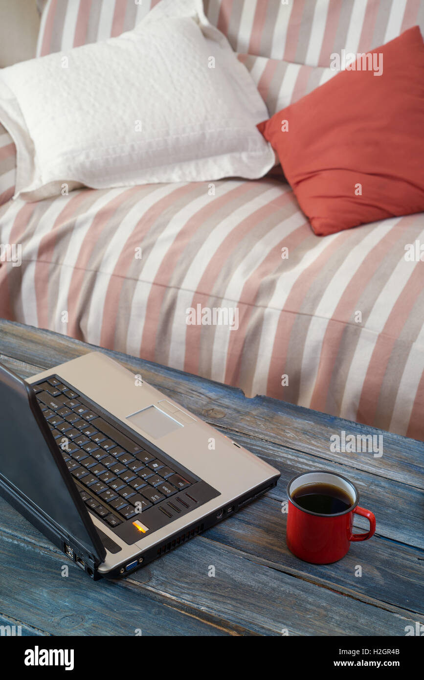 laptop on the coffee table in the living room Stock Photo