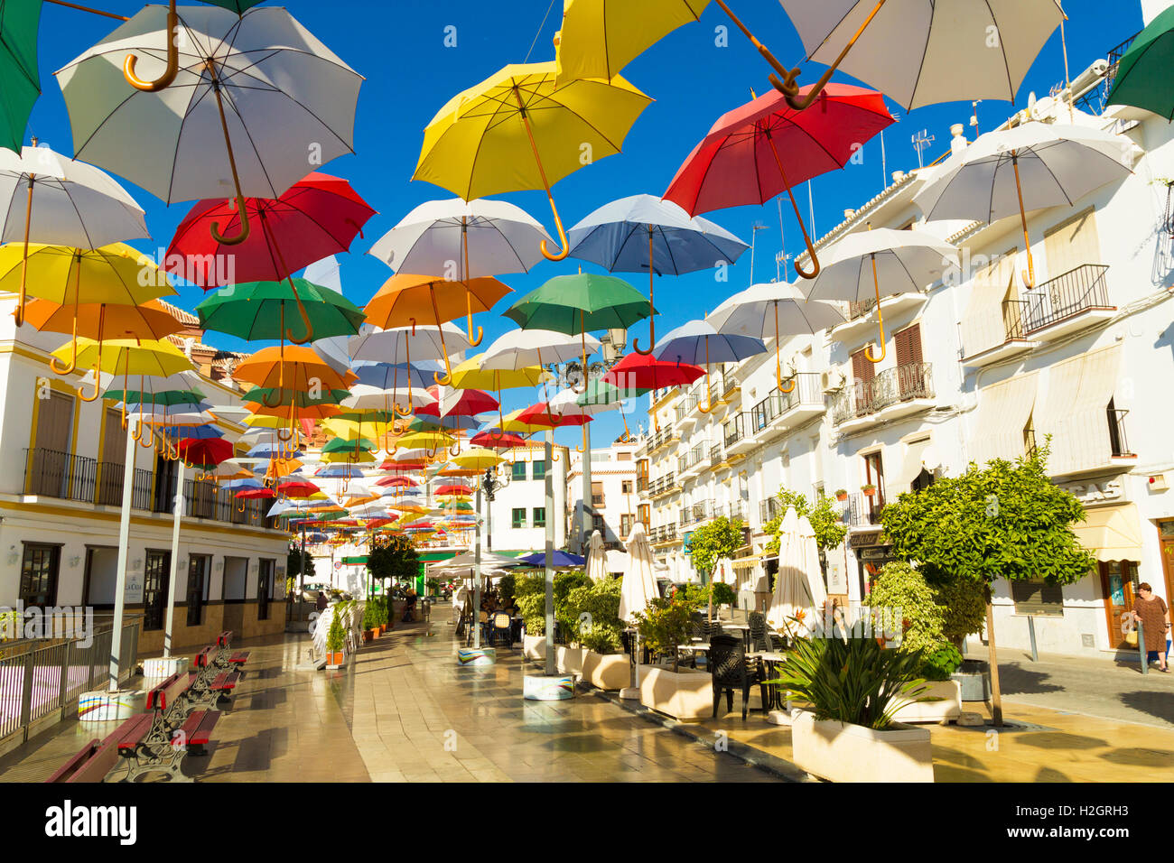 Lots of umbrellas hanging above the village square in Torrox Pueblo on