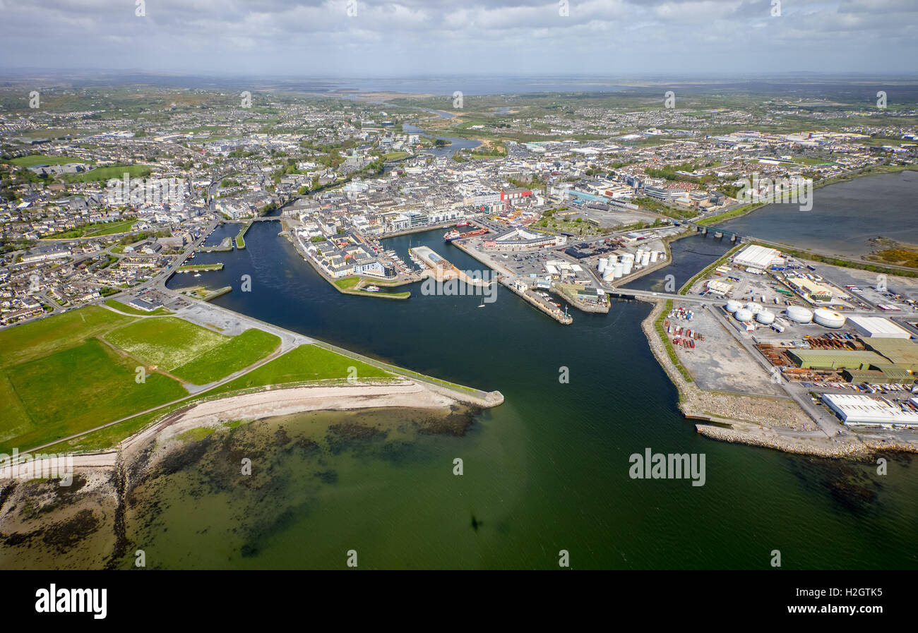 View of town and harbour, docks and Business Enterprise Park, Galway, County Clare, Ireland Stock Photo