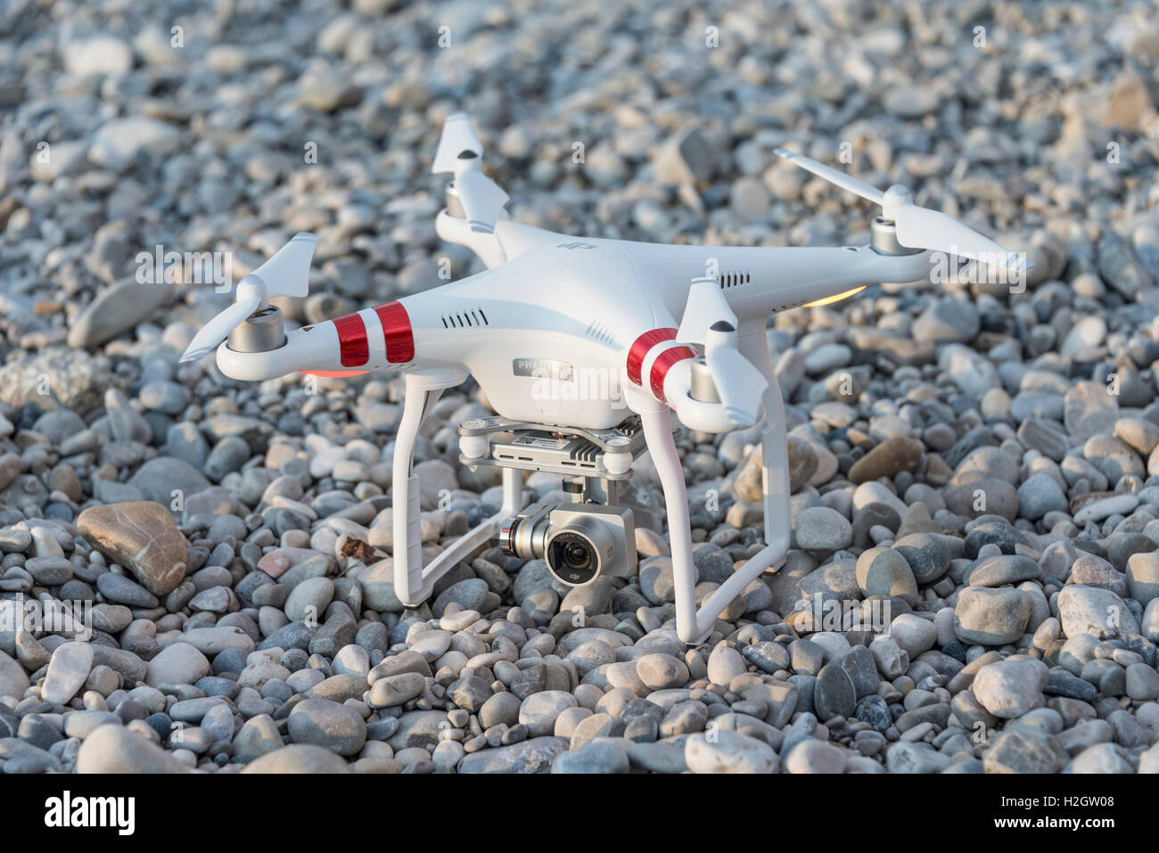 Quadcopter, drone with camera on ground, DJI Phantom 3 Stock Photo
