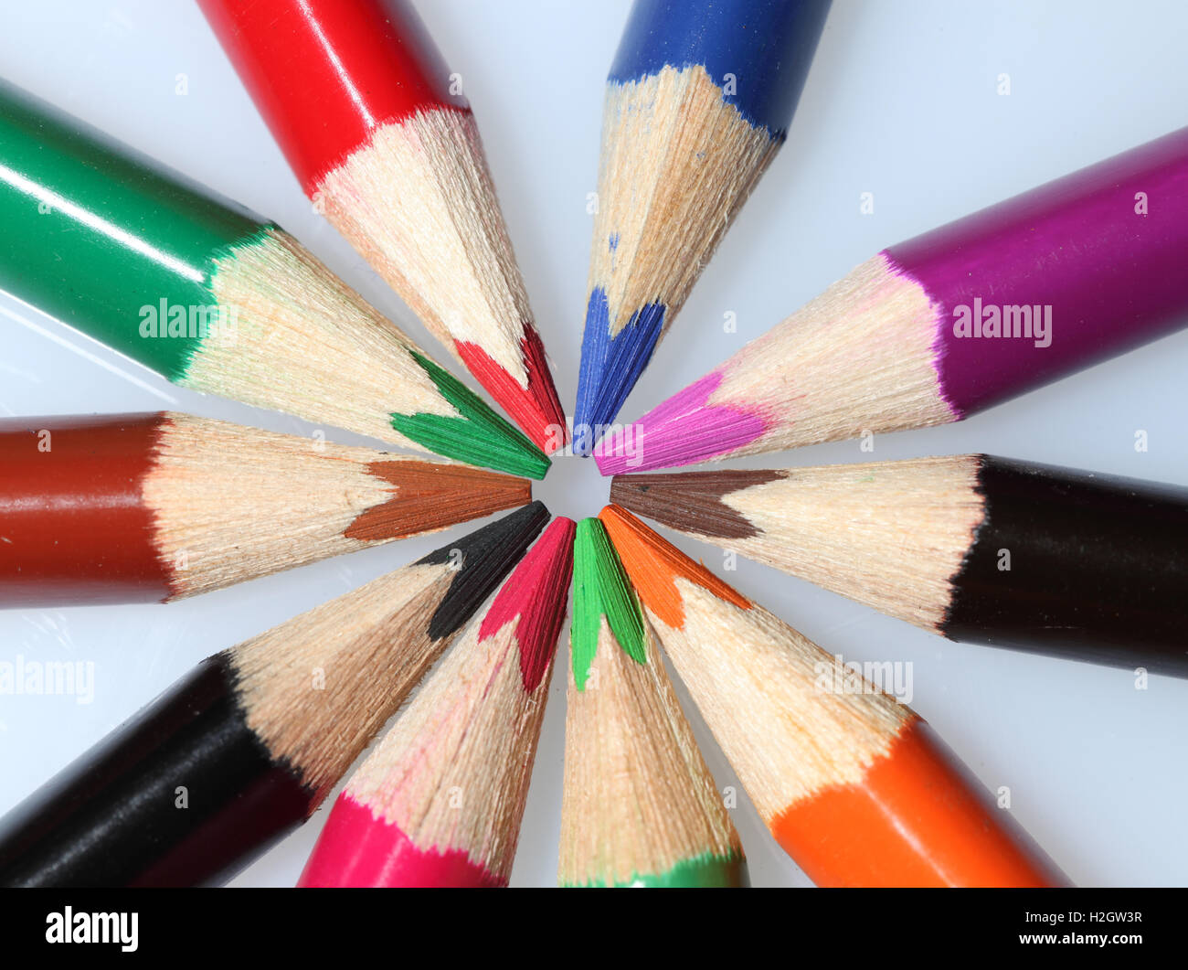 Colorful crayons in a circle, close-up Stock Photo