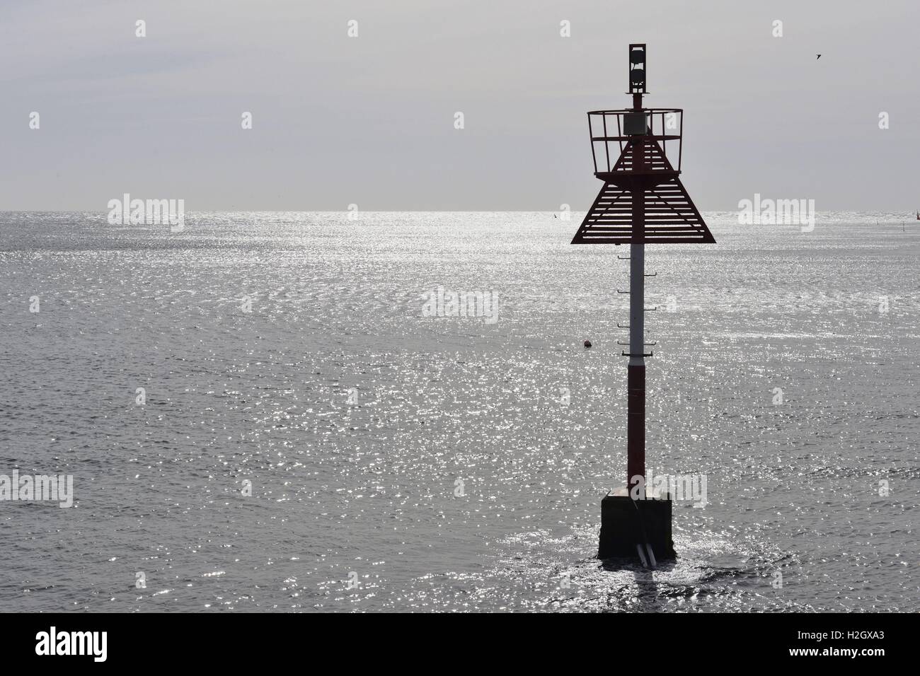 Triangular Gps A triangular navigation mark with light system in the North Sea marked ...