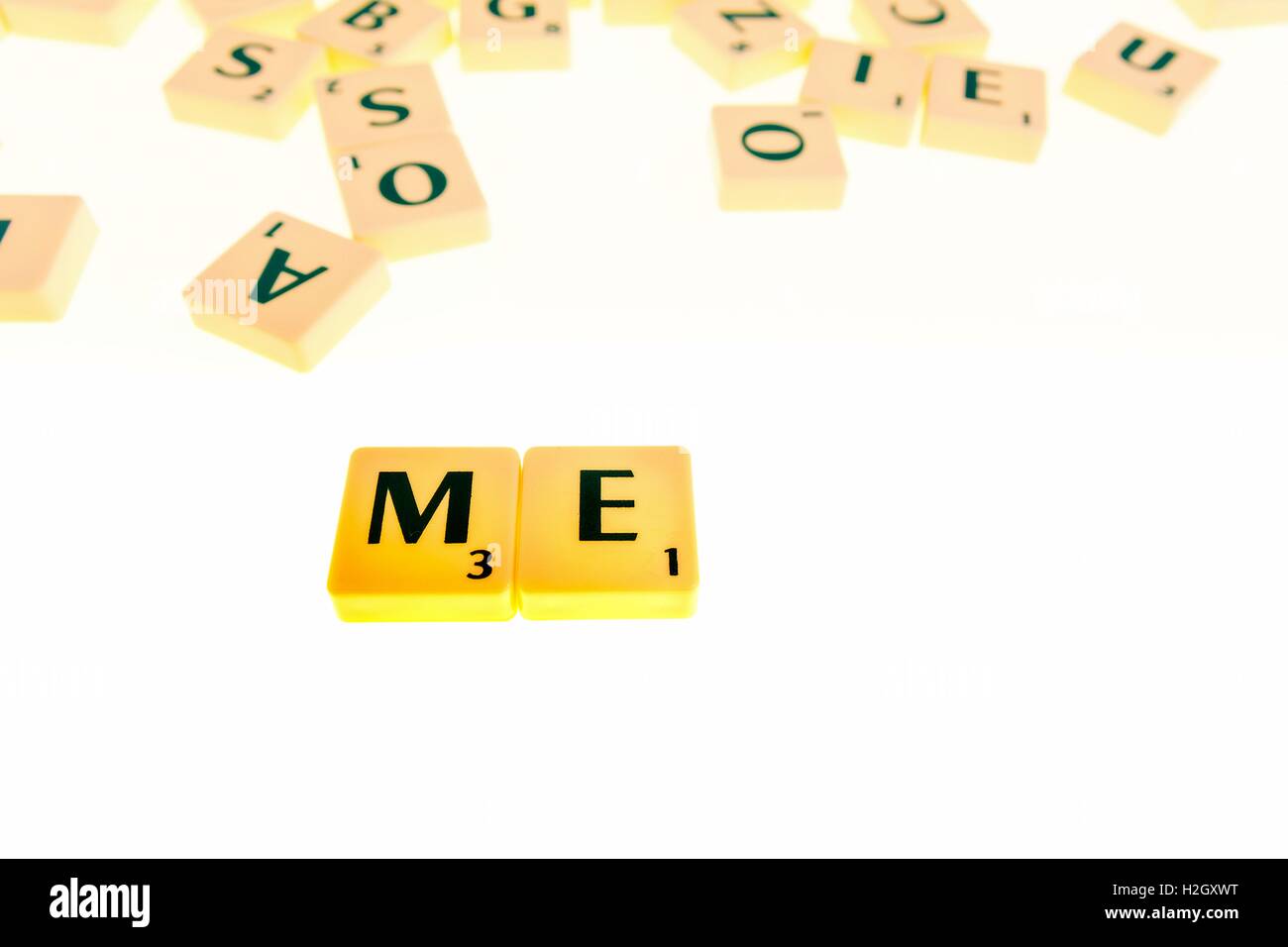 The Board Game having tiles with letters to form words and sentences Stock Photo
