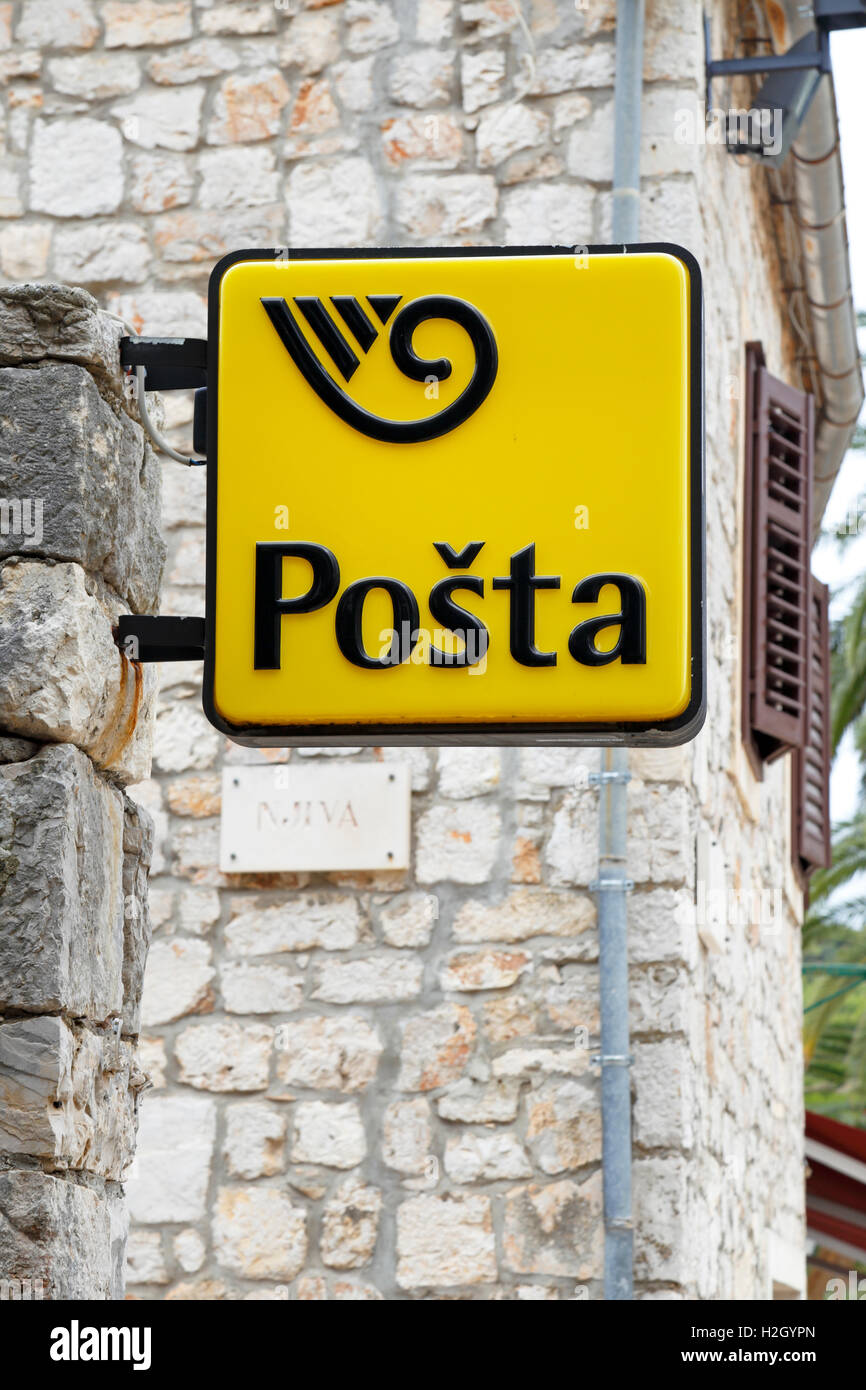 Yellow Posta Post Office sign, Stari Grad, Hvar Island, Croatia, Dalmatia, Dalmatian Coast, Europe. Stock Photo