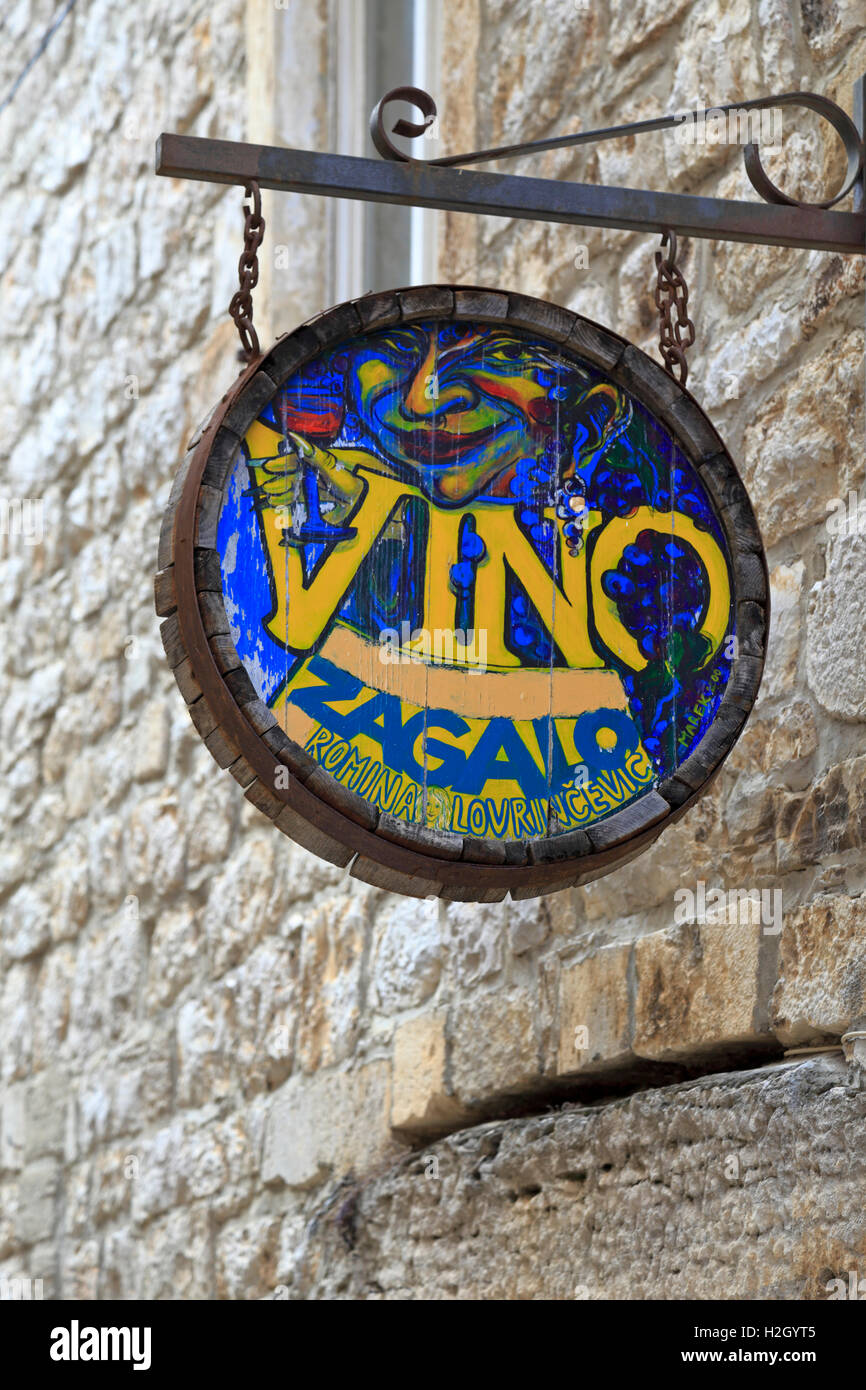 Vino Zagalo painted wine bar sign, Stari Grad, Hvar Island, Croatia, Dalmatia, Dalmatian Coast, Europe. Stock Photo