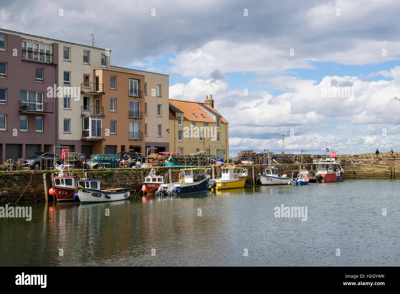 Fishing boats moored in the walled harbour. Royal Burgh St Andrews, Fife, Scotland, UK, Britain Stock Photo