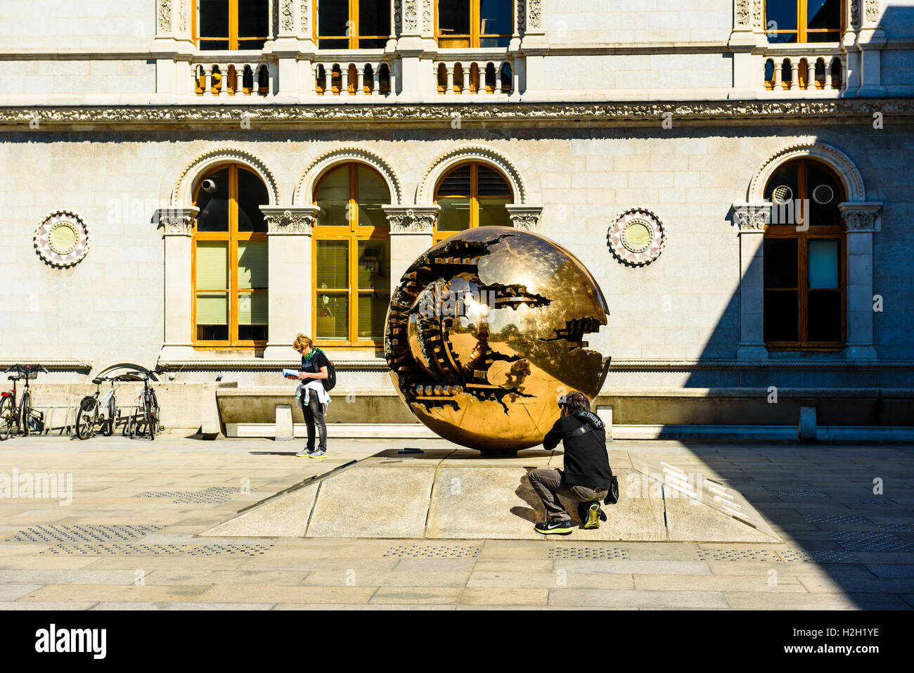 Sphere Within Sphere (Sfera con sfera) sculpture by Arnaldo Pomodoro, Trinity College Dublin, Ireland Stock Photo
