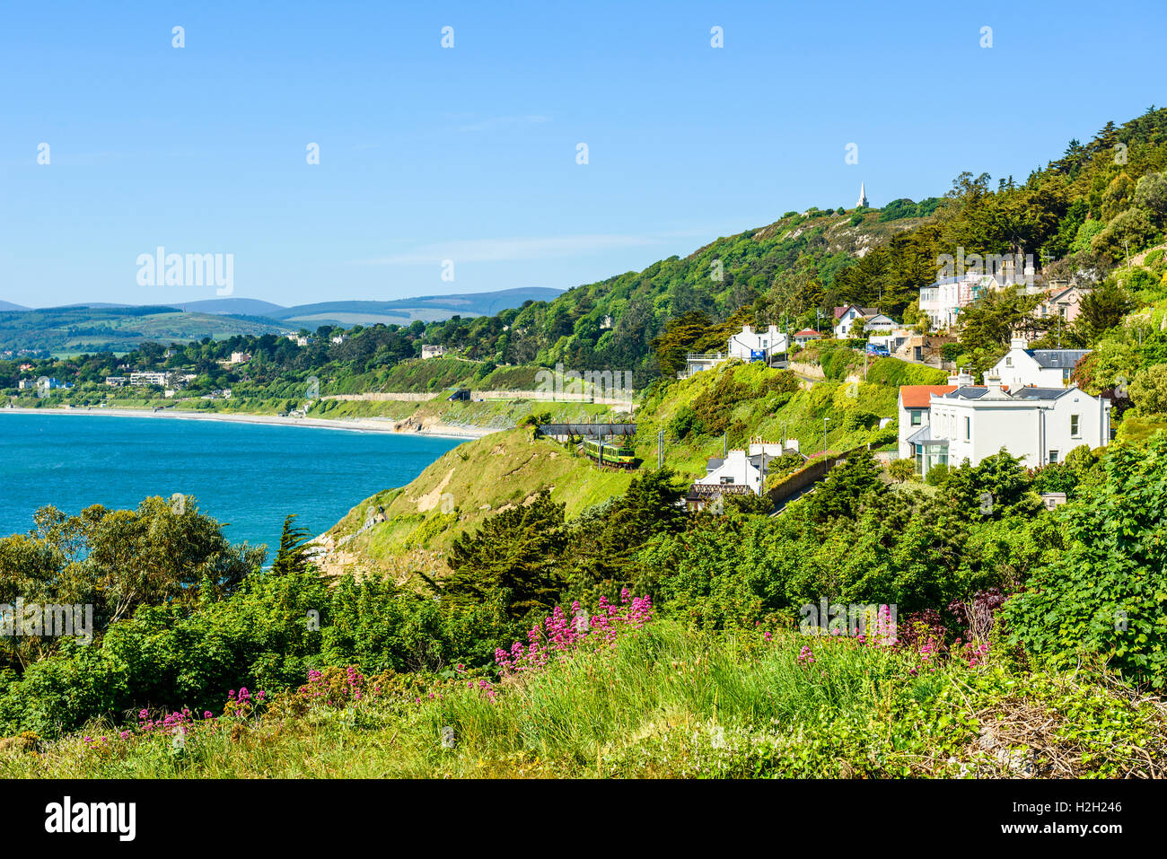 DART (Dublin Area Rapid Transit) train approaching Bray near Dublin Ireland Stock Photo
