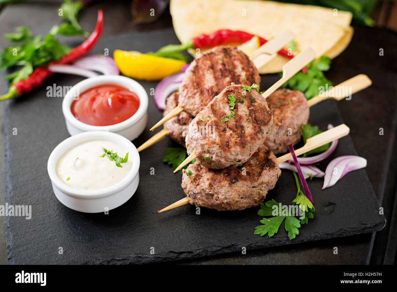 Appetizing Kofta Kebab Meatballs With Sauce And Tortillas Tacos On Stock Photo Alamy Appetizing Kofta Kebab Meatballs With Sauce And Tortillas Tacos On Stock Photo Alamy