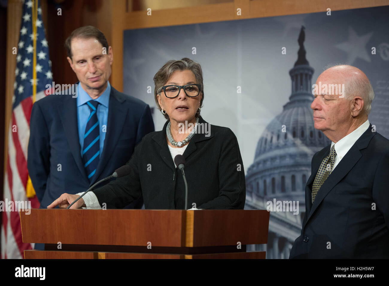 U.S. Democratic Party Senators (L-R) Ron Wyden from Oregon, Barbara Boxer from California, and Ben Cardin from Maryland, take turns discussing the Presidential Tax Transparency Act at a press conference in the Senate Radio/TV Gallery of the U.S. Capitol Building September 15, 2016 in Washington, D.C. Stock Photo