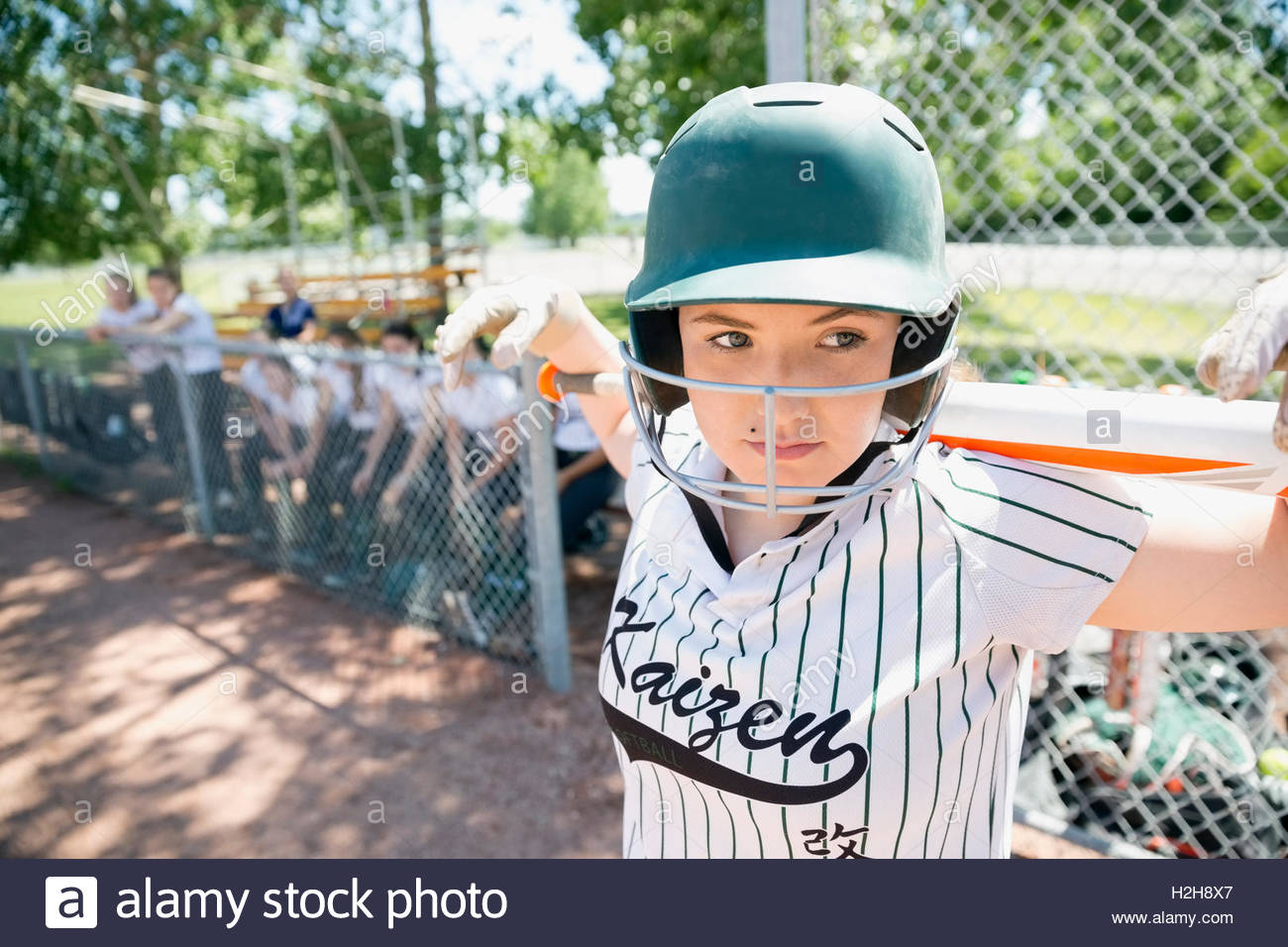 Focused middle school girl softball player ready to bat Stock Photo Alamy