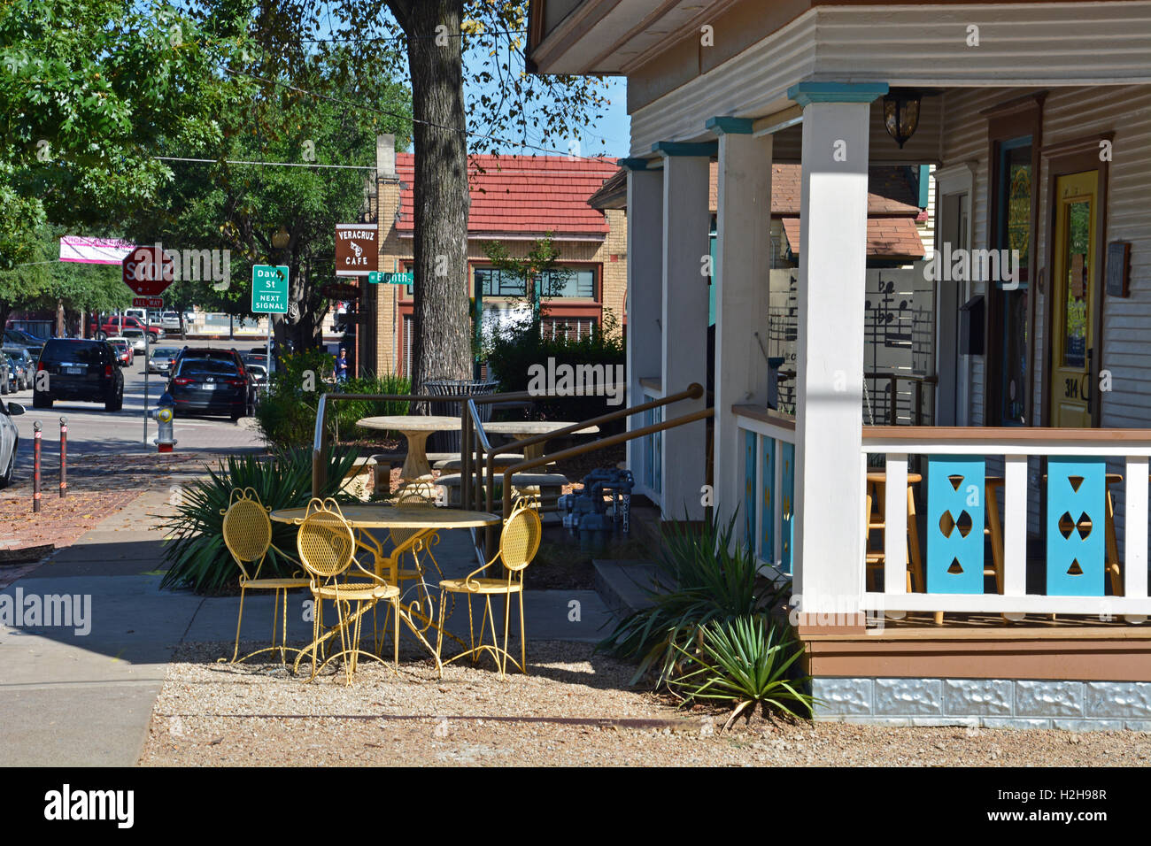 Outdoor seating next to a pie and coffee shop in the trendy Bishop Arts District of the Oak Cliff neighborhood in Dallas Texas. Stock Photo