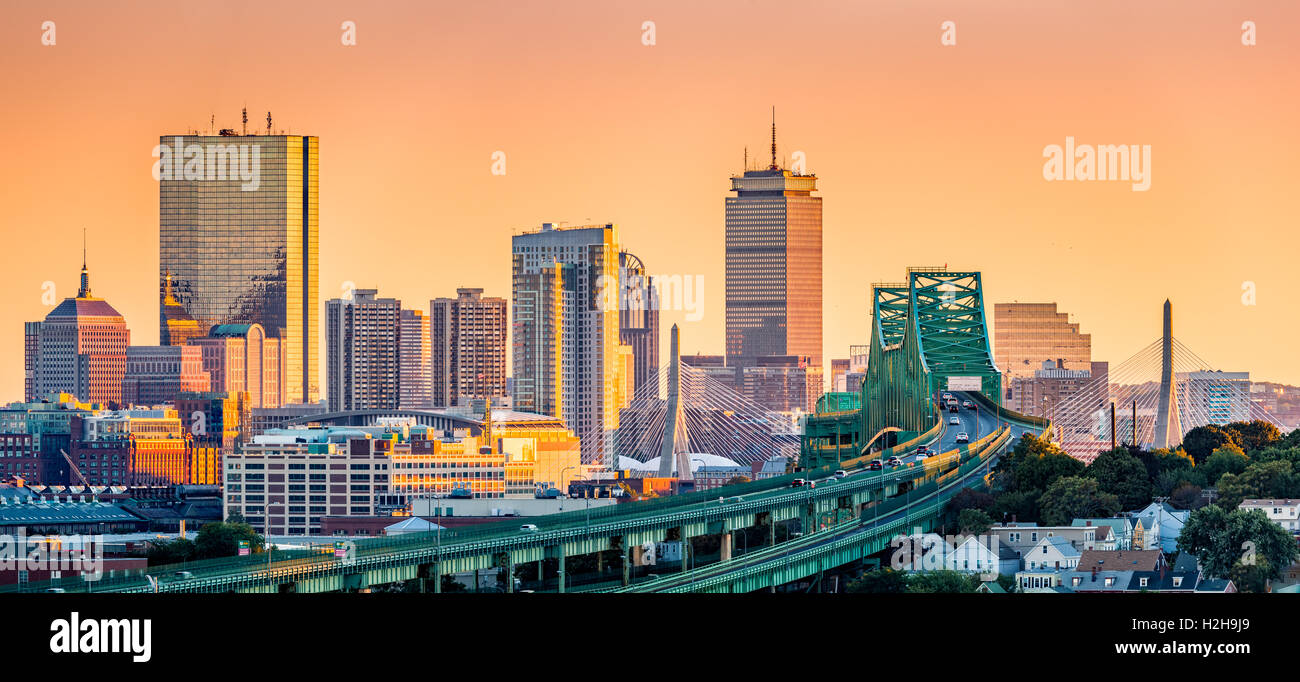 Tobin bridge, Zakim bridge and Boston skyline panorama at sunset. Stock Photo