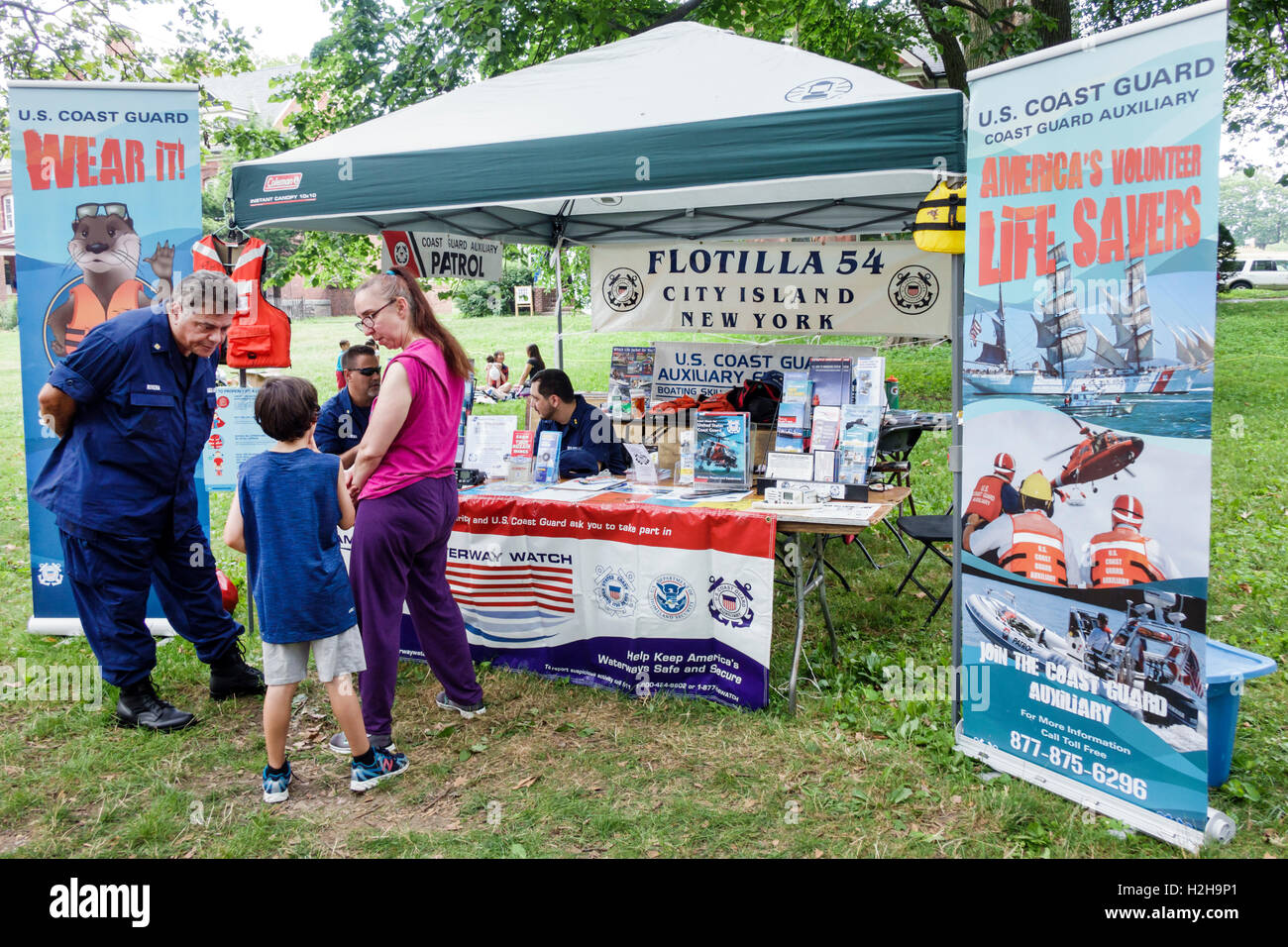 New York City,NY NYC New York Harbor,Governors Island,City of Water Day,harbor festival,family families child children U.S. Coast Guard Auxiliary,volu Stock Photo