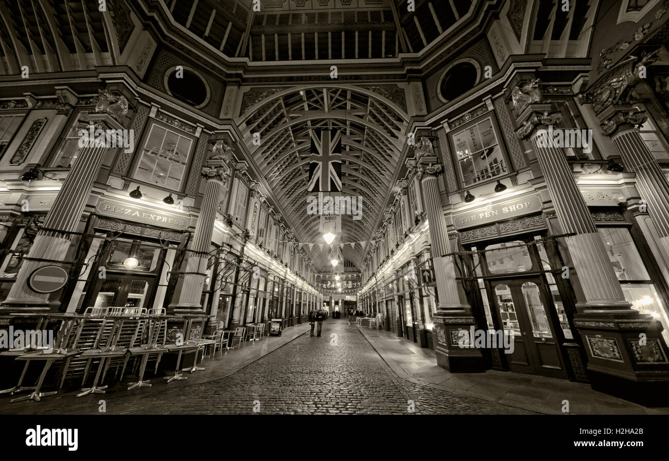 Leadenhall market at night,City Of London,England,UK - Panorama with Union Flag B/W Stock Photo