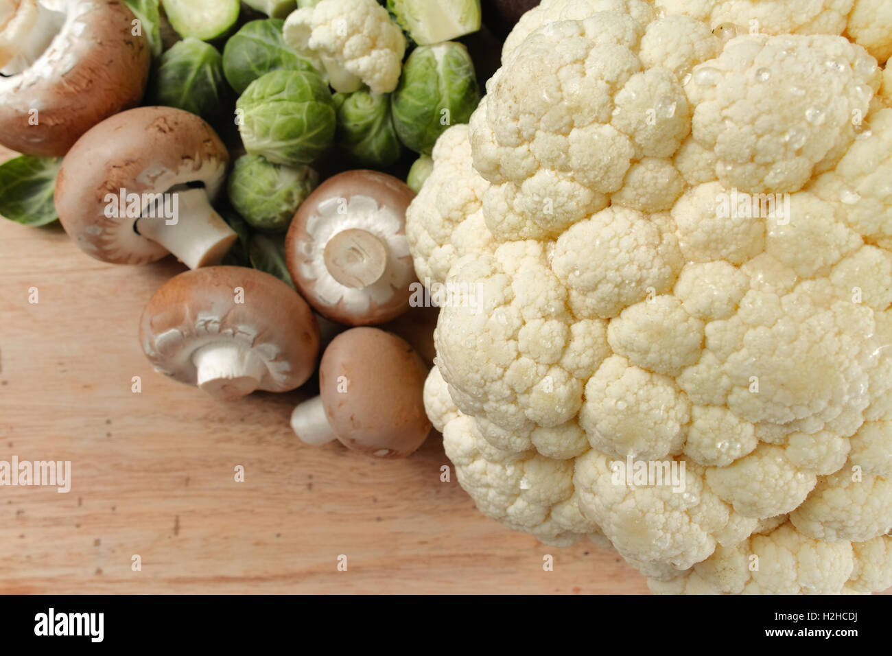 Cauliflower, mushrooms and Brussels sprouts - fresh healthy vegetables for cooking Stock Photo