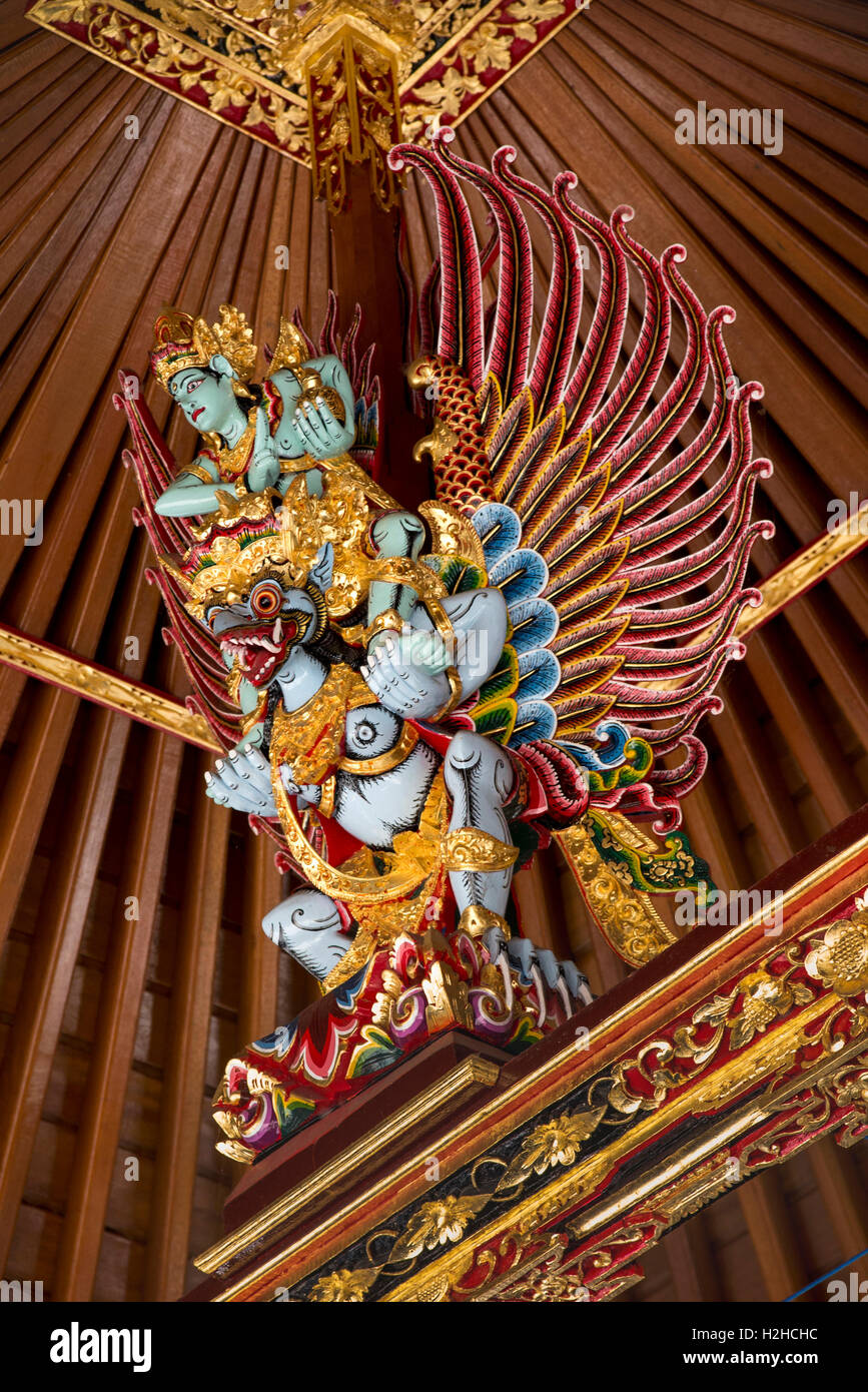 Indonesia, Bali, Goa Gajah, Hindu temple, ornate painted carving of Vishnu riding Garuda Stock Photo
