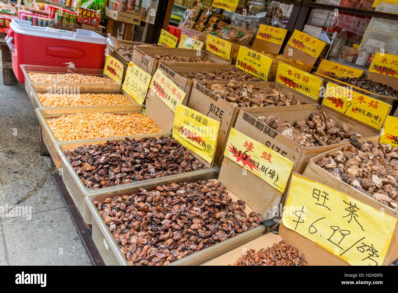 A Chinese grocery market in Chinatown Manhattan New York City The market displays fruit vegetables and other edibles. Stock Photo