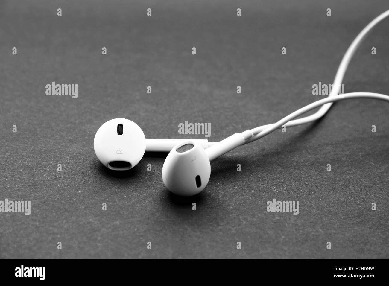 Headphones of white color isolated on black Stock Photo