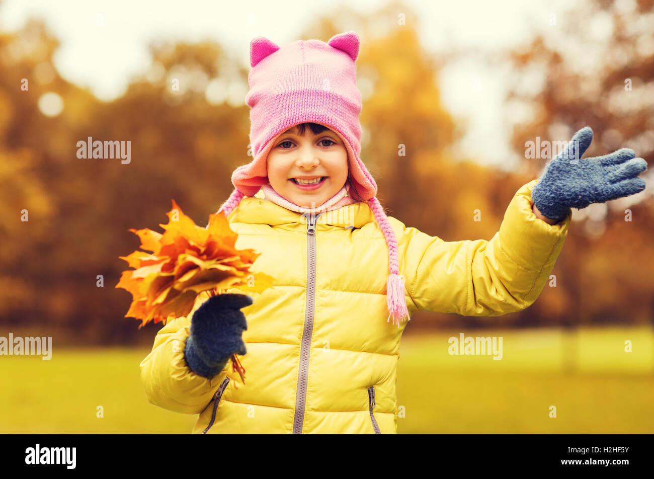 happy beautiful little girl portrait outdoors Stock Photo - Alamy