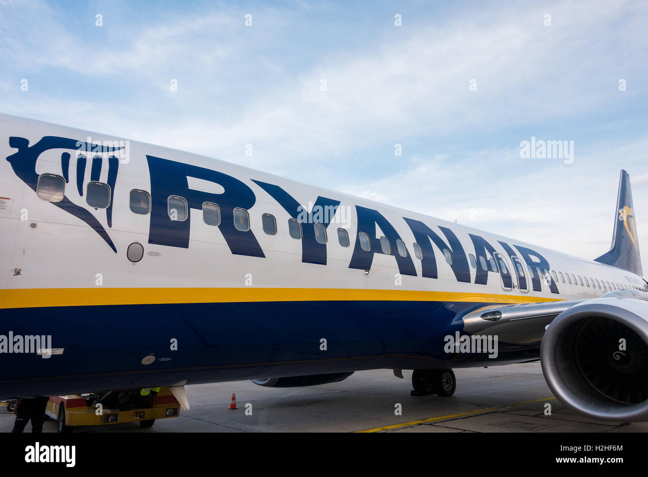 Passengers boarding on the aircraft of low cost airline company Ryanair