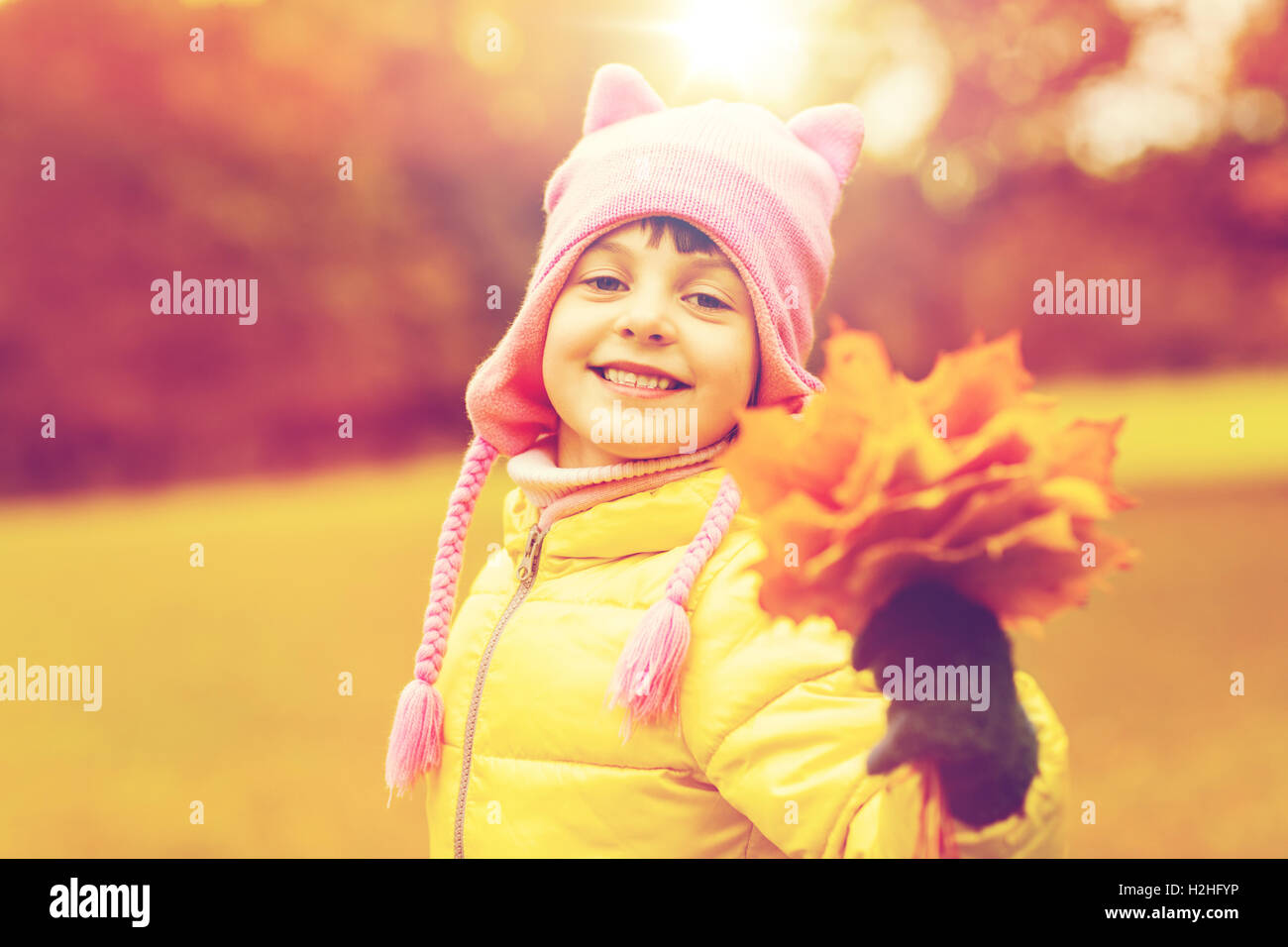 happy beautiful little girl portrait outdoors Stock Photo - Alamy