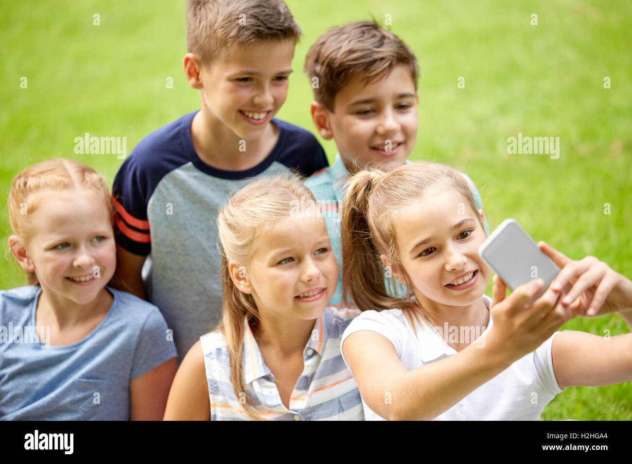 Happy Kids Or Friends Taking Selfie In Summer Park Stock Photo Alamy