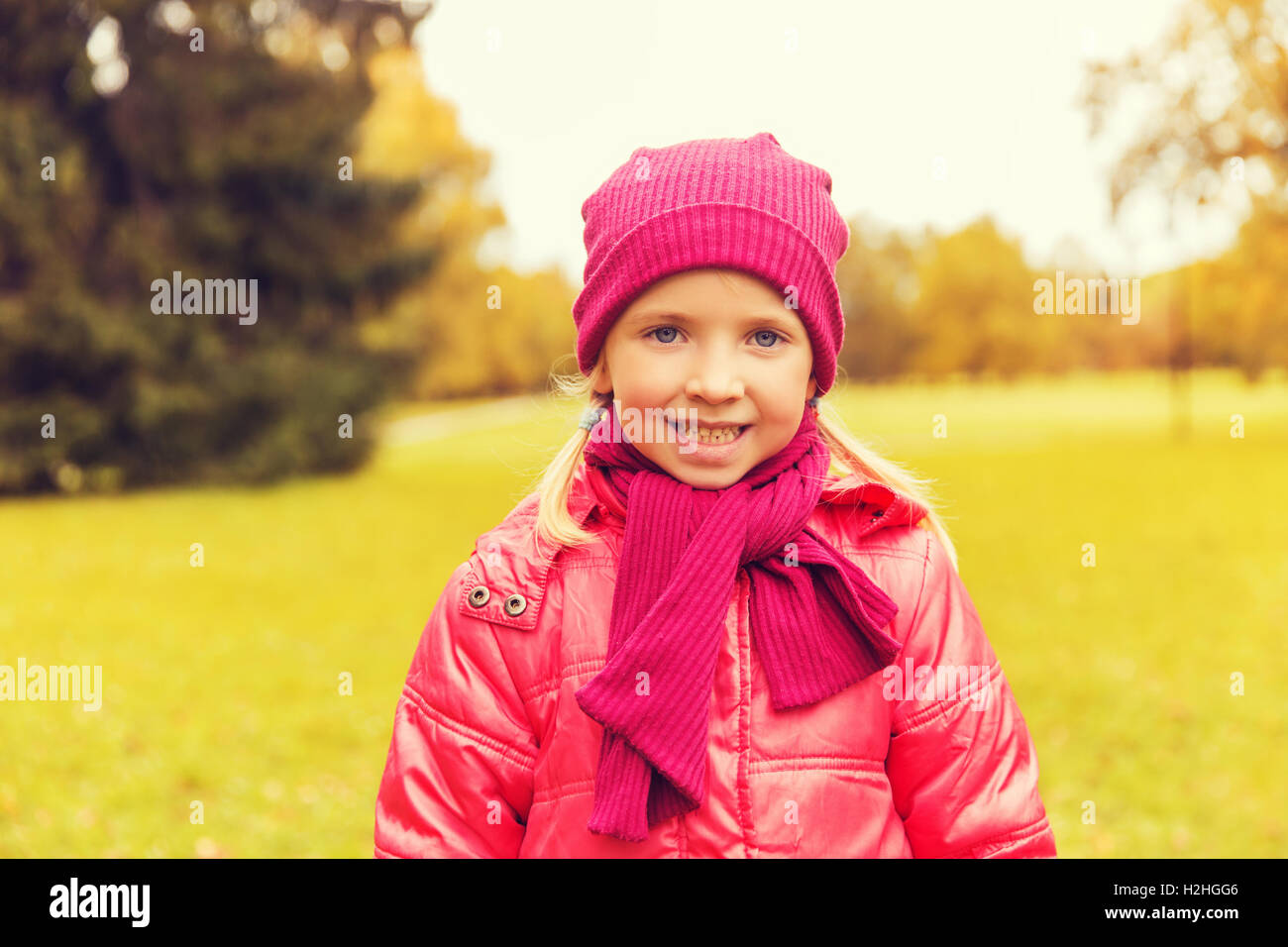 happy beautiful little girl portrait outdoors Stock Photo - Alamy