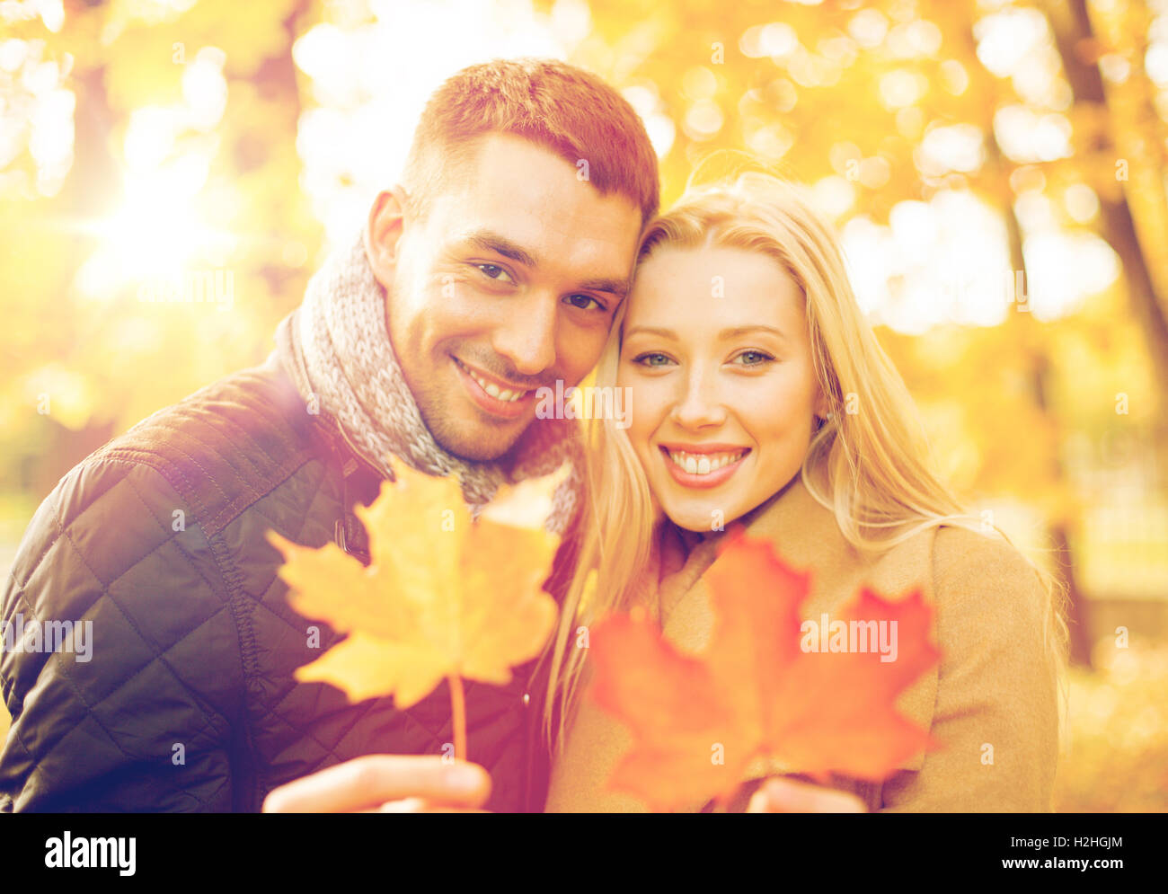 romantic couple in the autumn park Stock Photo - Alamy
