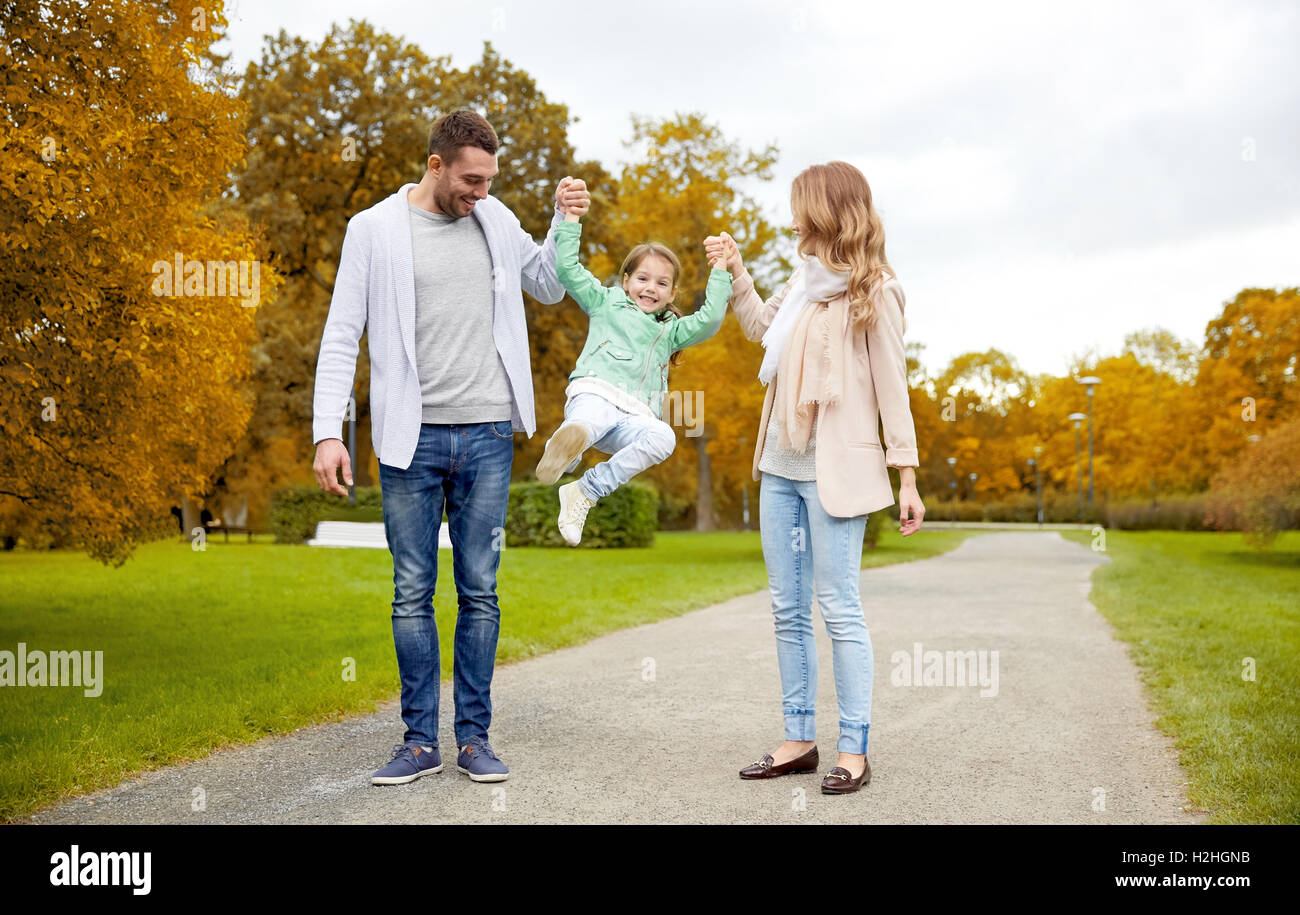 happy family walking in summer park and having fun Stock Photo - Alamy