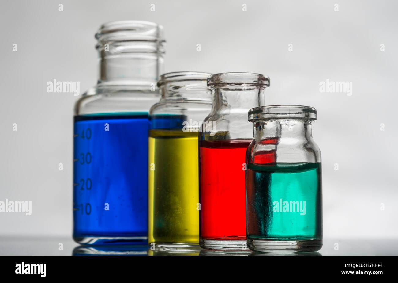 Set of laboratory bottles with color liquid Stock Photo Alamy