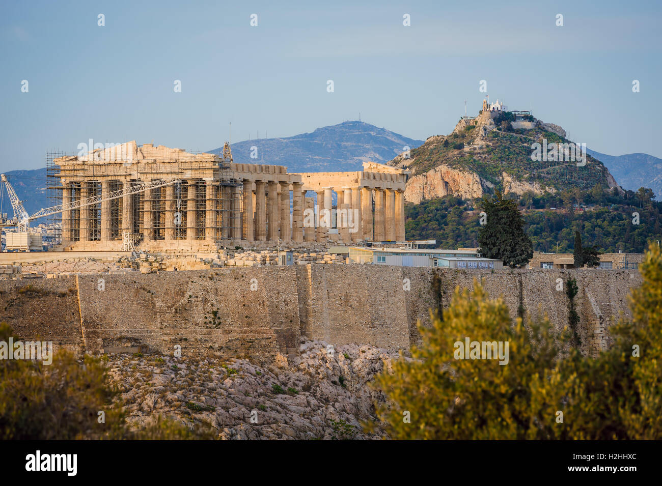 acropolis in rays of sunset Stock Photo