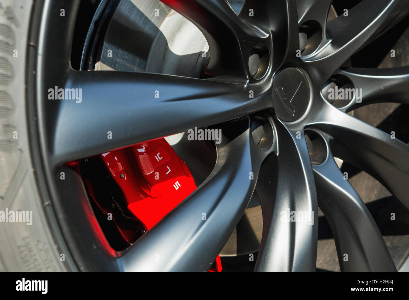 TILGURG, NETHERLANDS - SEPTEMBER 25, 2016: TESLA  MODEL-X. Detail on logo on wheel. Tesla Motors Assembly Plant in Tilburg, Neth Stock Photo