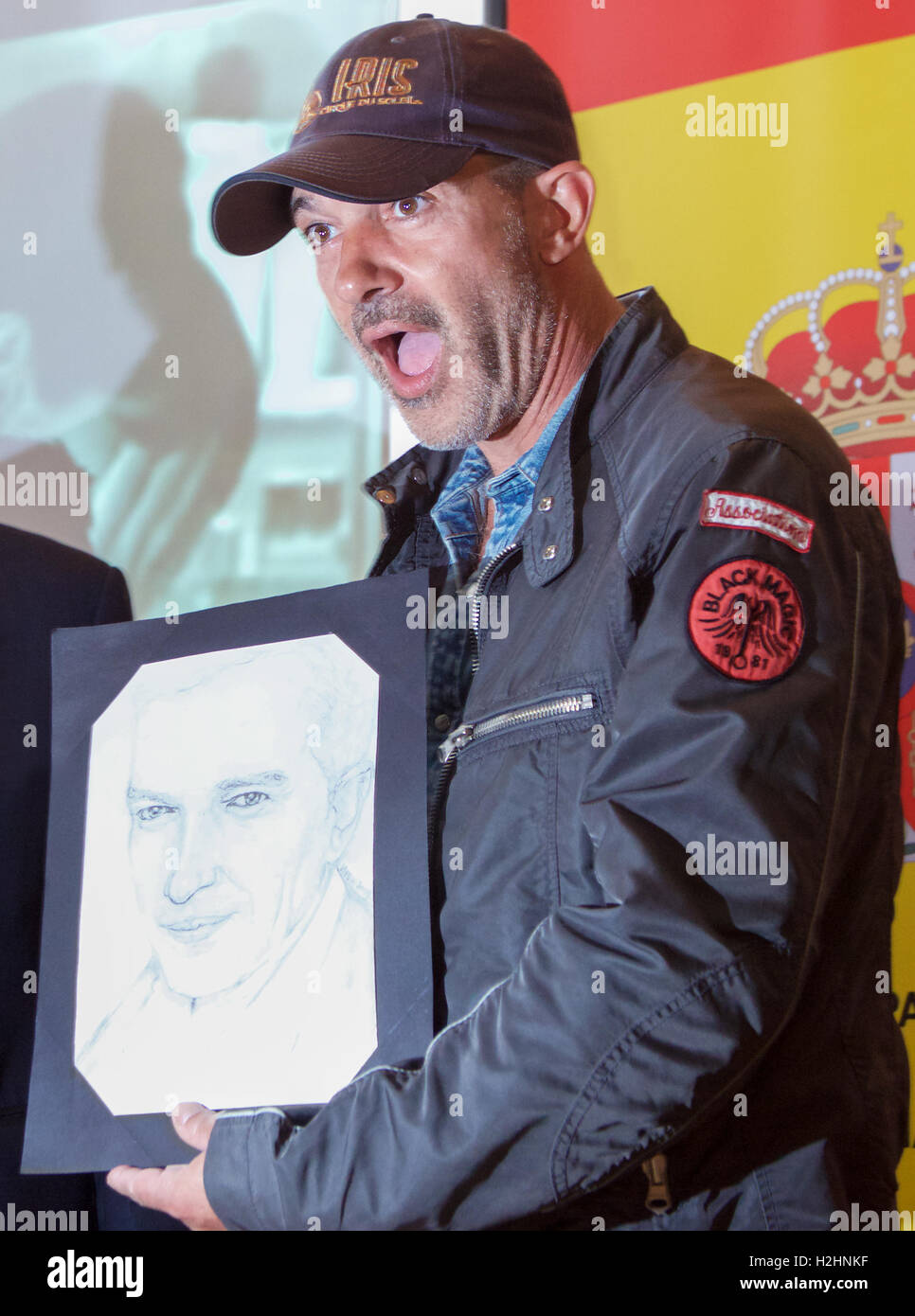 Sofia, Bulgaria - June 11, 2013: Antonio Banderas is reacting when given a drawing from a fan at Mati hall press conference duri Stock Photo