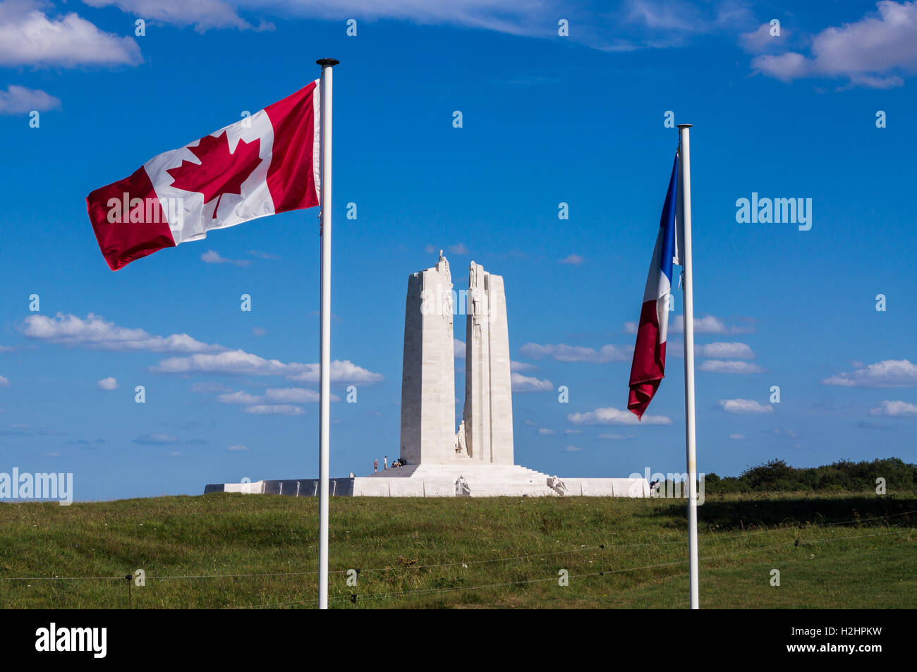 National flags, Canadian National Vimy Memorial by Walter Seymour Allward, 1925 - 1936, Vimy Ridge, Pas-de-Calais, Hauts de France, France Stock Photo