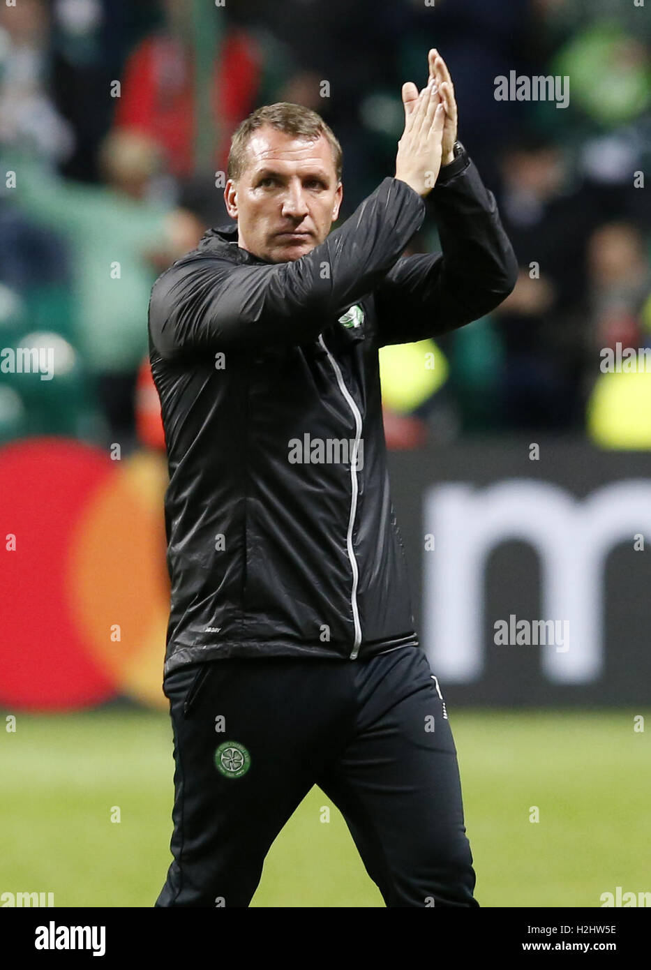 Celtic manager Brendan Rodgers applauds supporters after the final whistle during the UEFA Champions League, Group C match at Celtic Park, Glasgow. Stock Photo