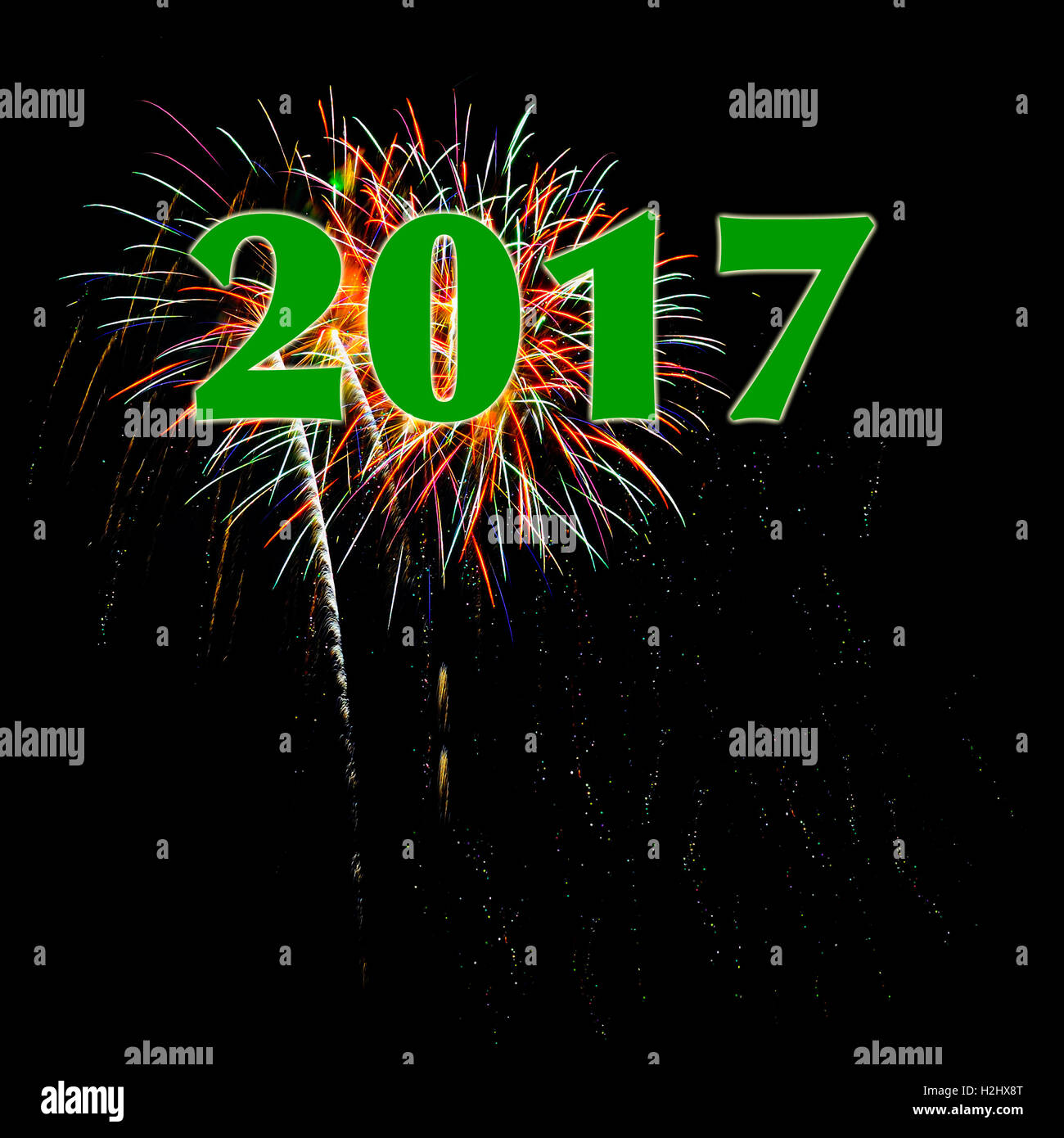 Year 2017 green numbers fireworks black background for New Year's Day