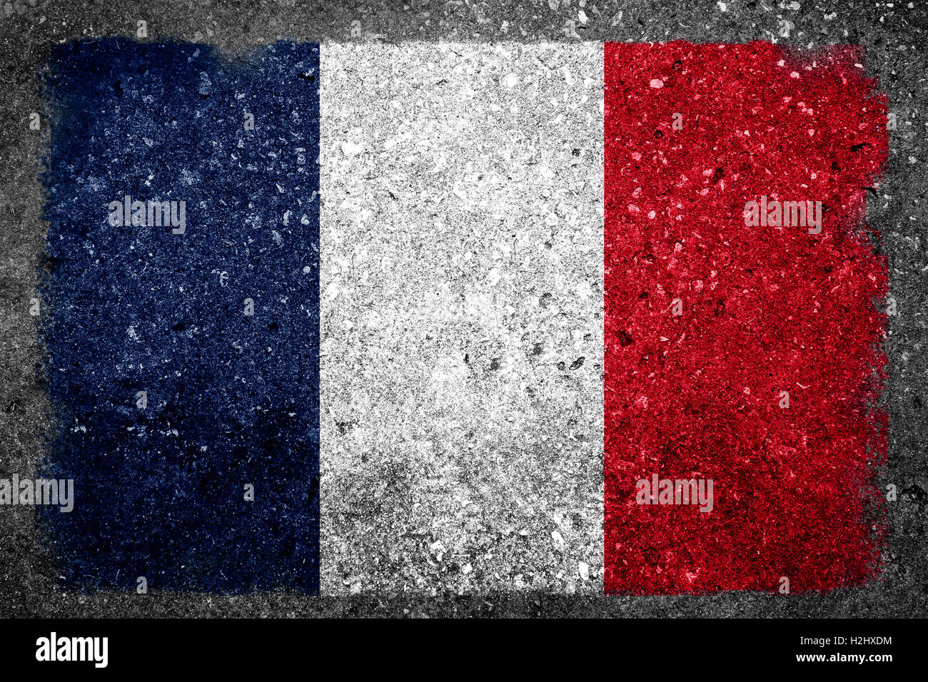 Flag of France painted on a grunge wall. Stock Photo