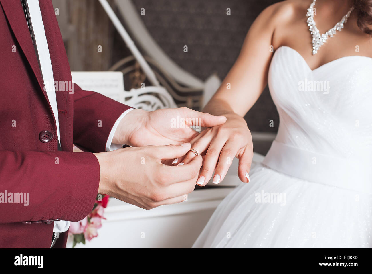 wedding rings and hands of bride and groom. young wedding couple at ceremony. matrimony. man and woman in love. two happy people Stock Photo - Alamy wedding rings and hands of bride and groom. young wedding couple at ceremony. matrimony. man and woman in love. two happy people Stock Photo - Alamy