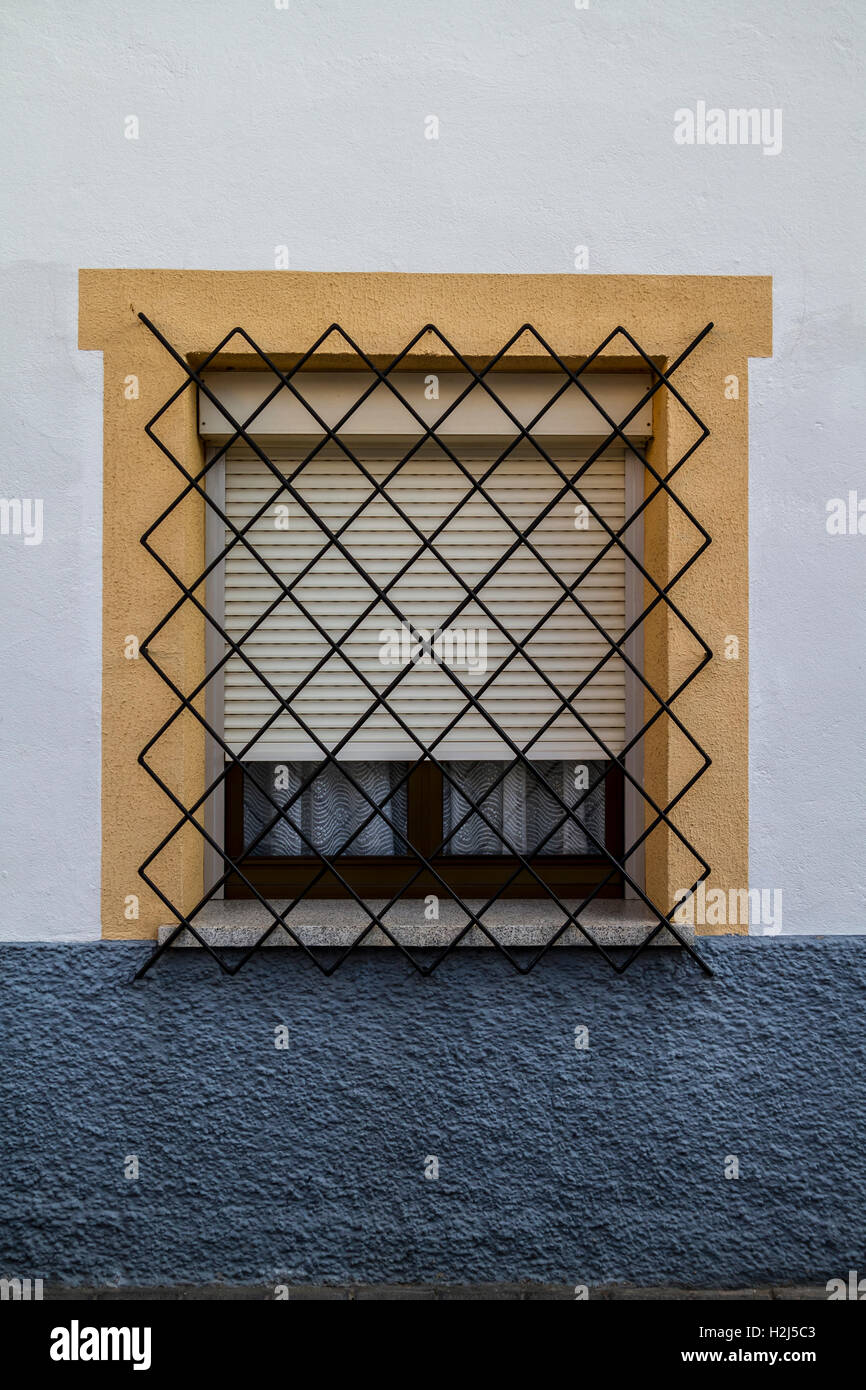 Spanish style window, in white house Stock Photo