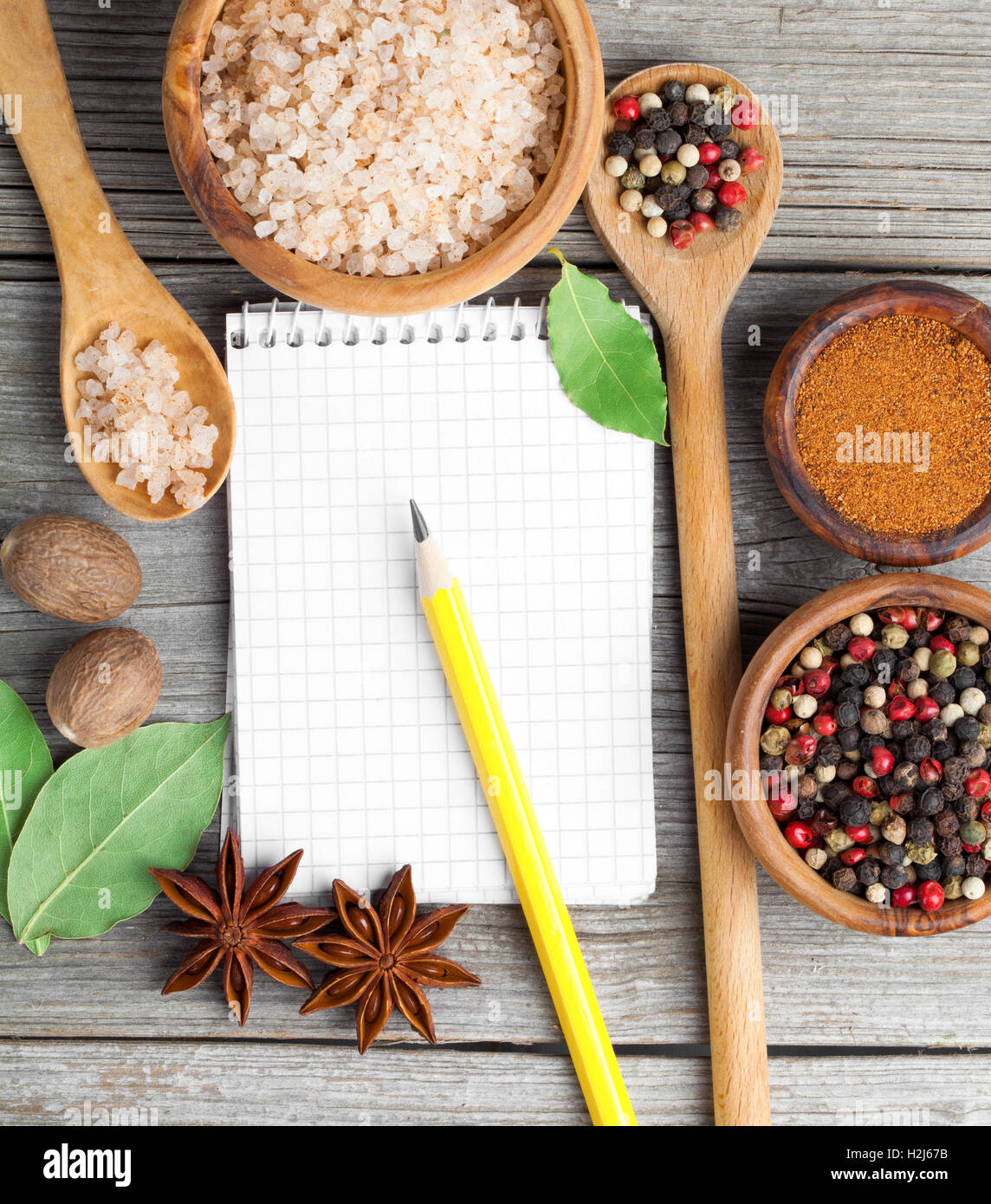 top view of recipe book with ingredients on wooden table Stock Photo