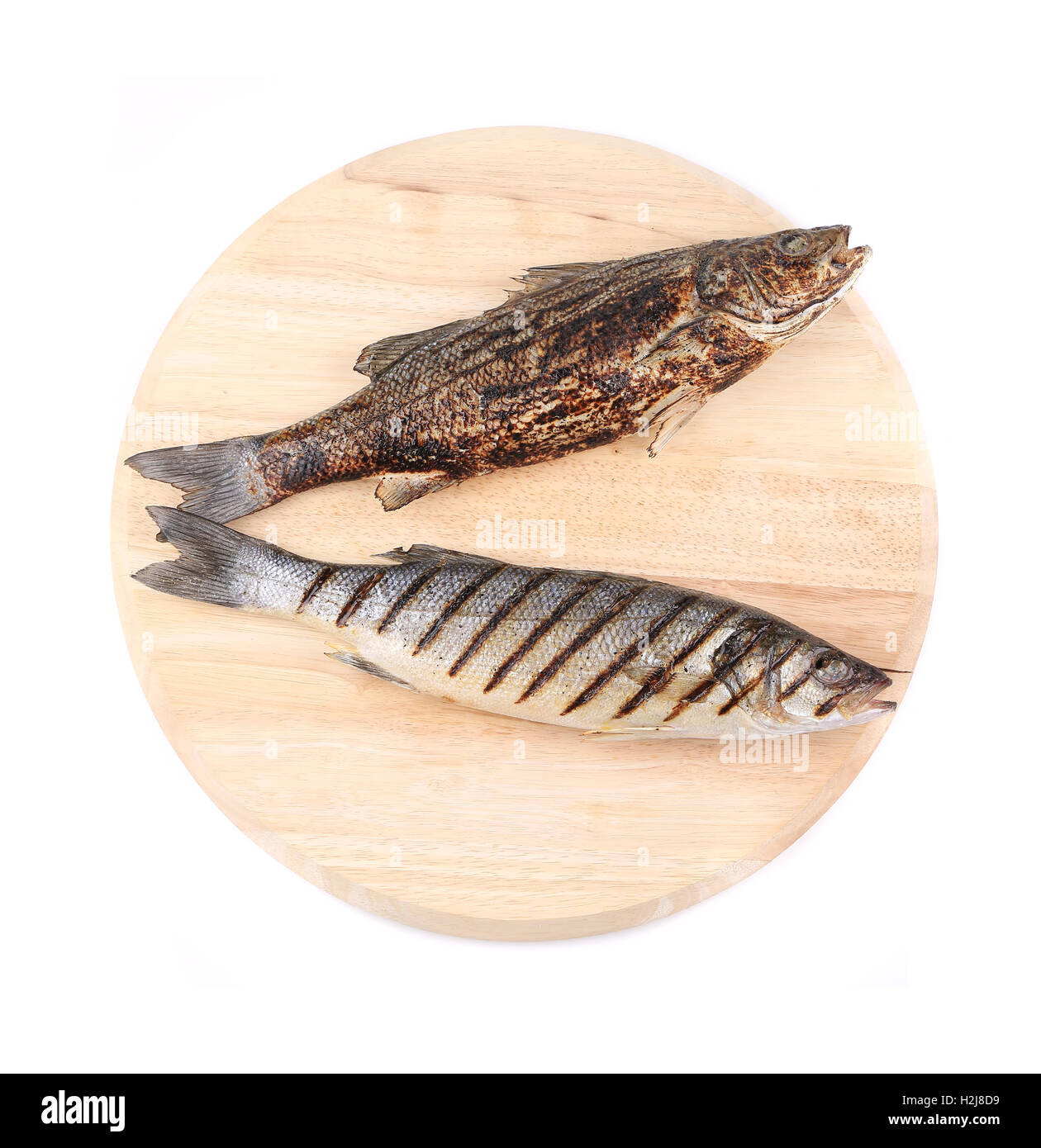 Two grilled fish on platter Stock Photo Alamy