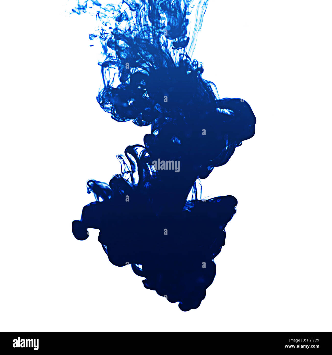 Ink in water on white background Stock Photo Alamy