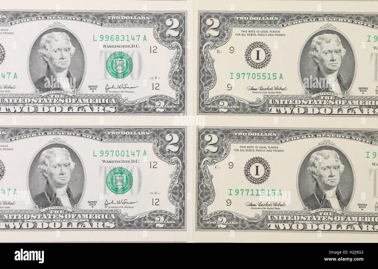 Two dollar bills background Stock Photo - Alamy