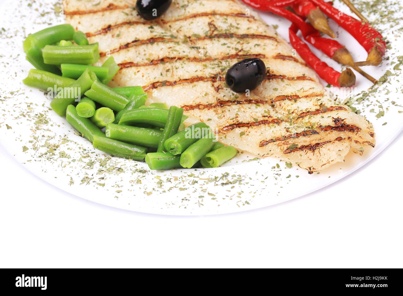 Grilled fish with herbs. Stock Photo