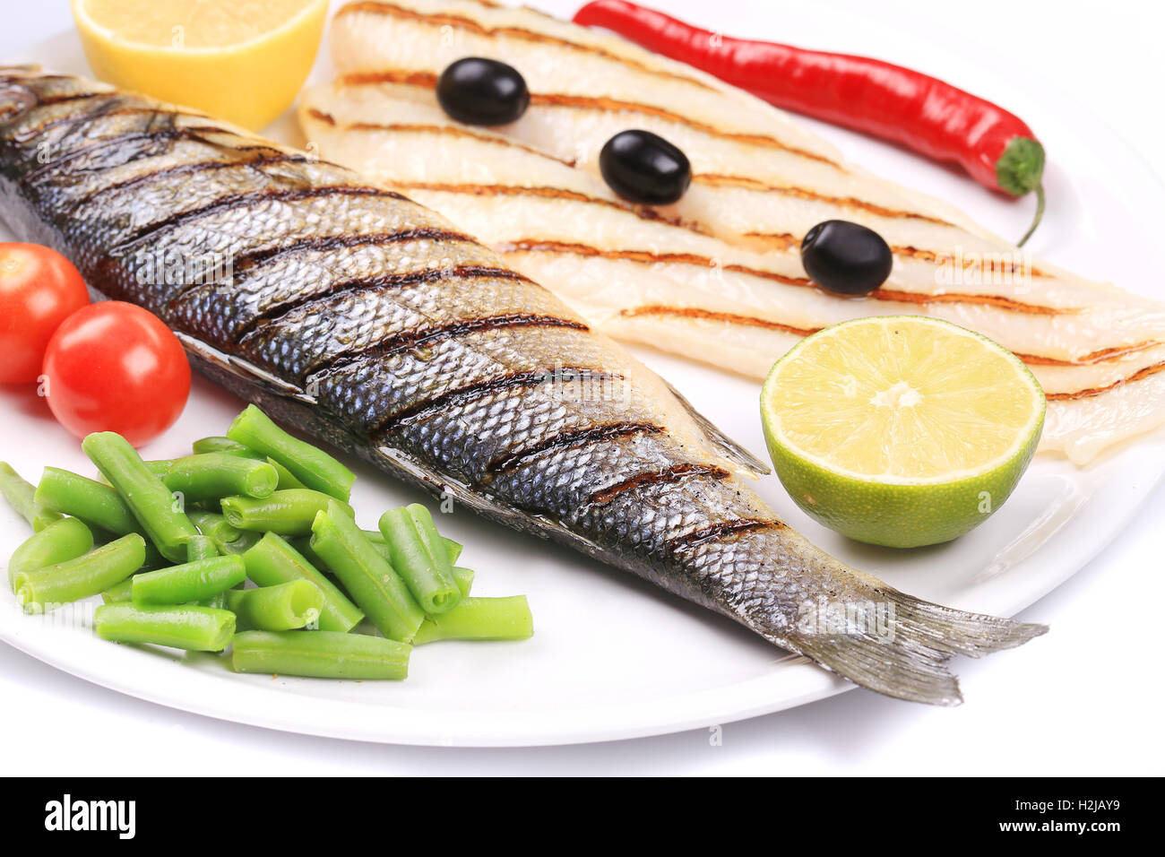 Grilled seabass with pangasius fillet Stock Photo Alamy