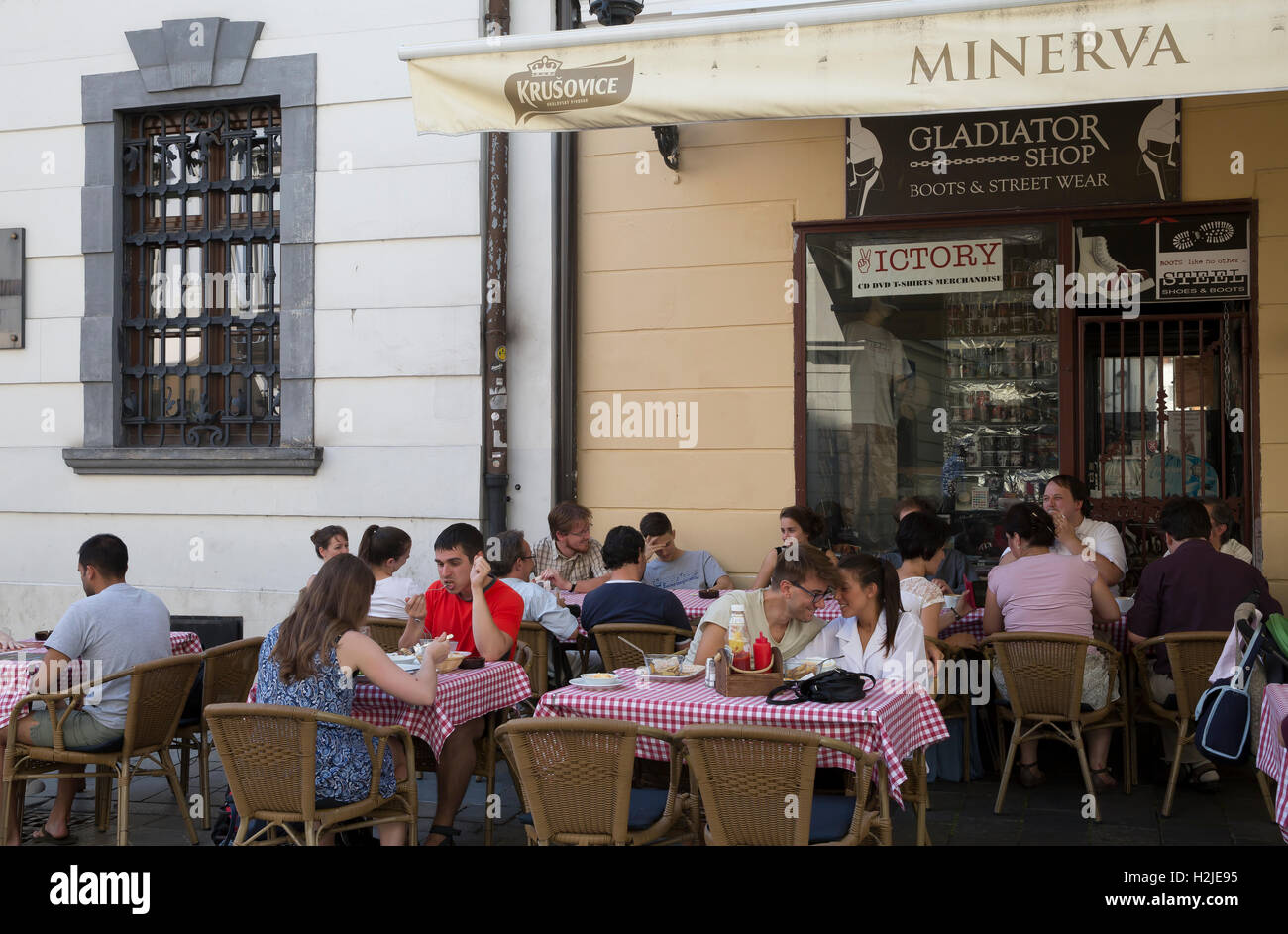 People dine Al Fresco outside Minerva Restaurant in Bratislava Slovakia Stock Photo