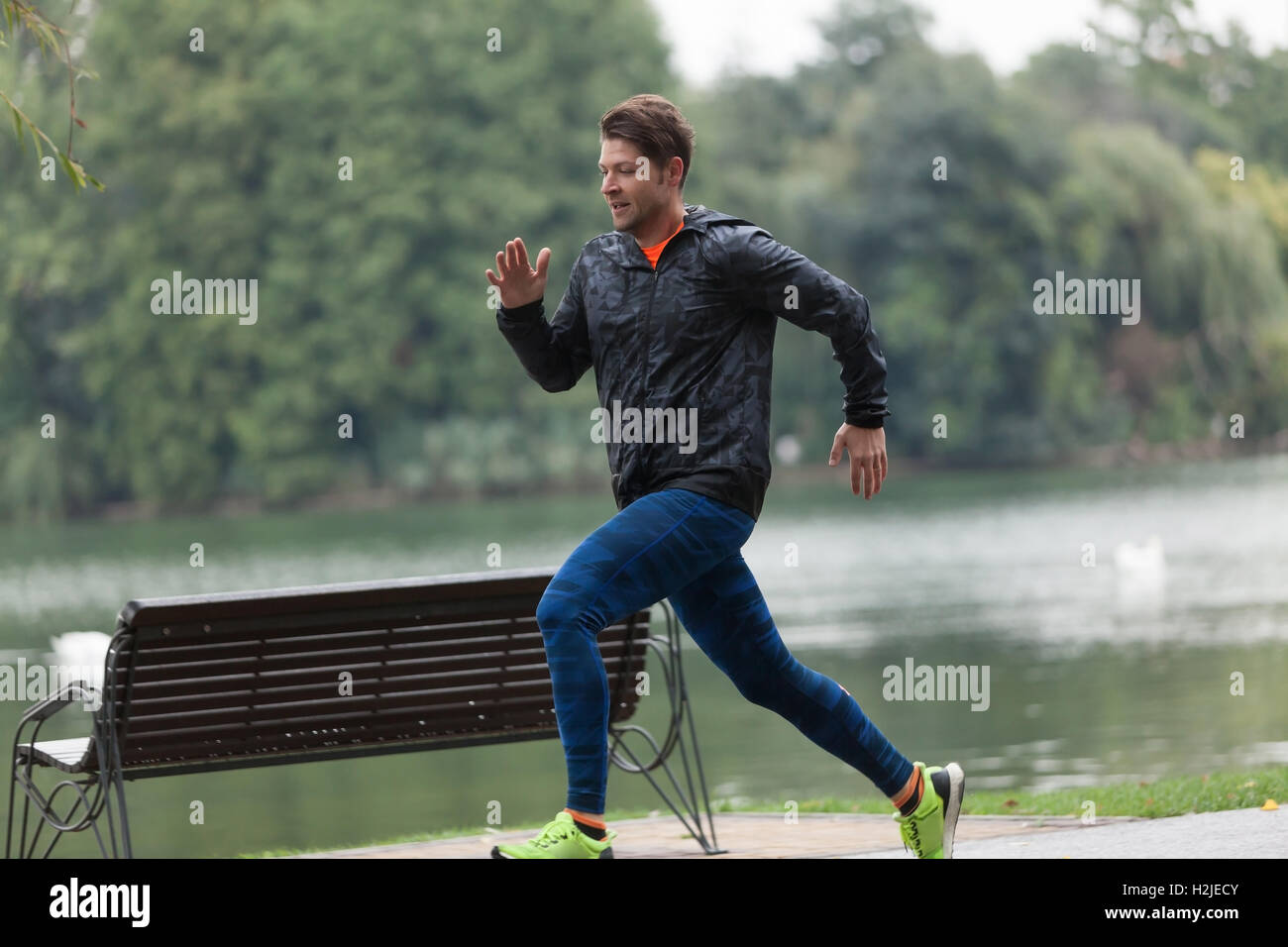Jogging While Raining Athlete running in rain hi-res stock photography and images - Alamy