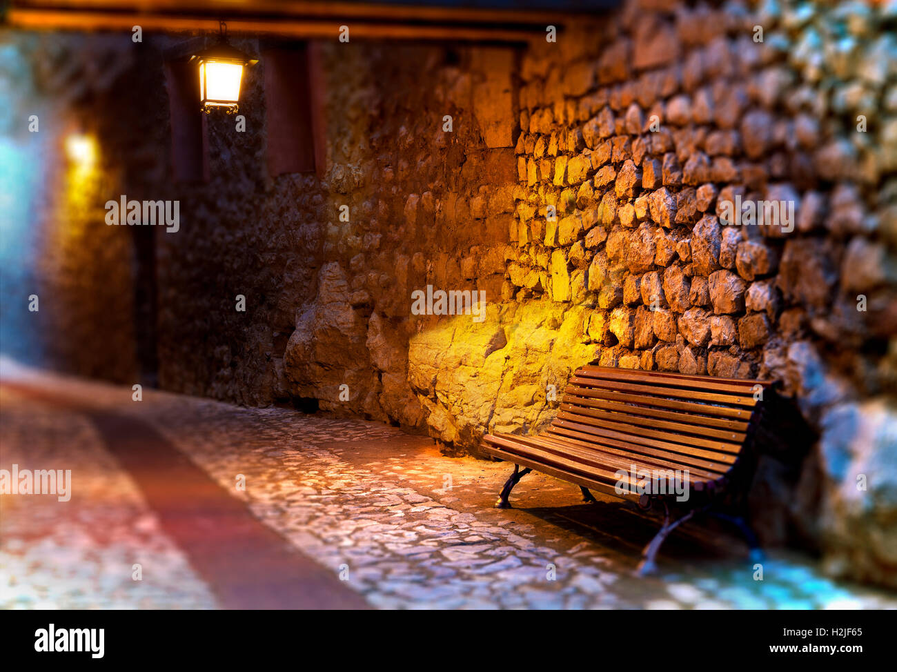 Rural town scenery.Bench and lamp on village Stock Photo