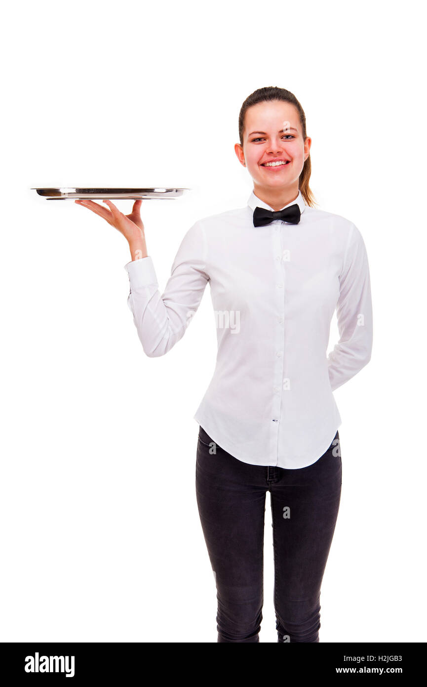 Young woman in waiter uniform holding tray isolated over white background. Stock Photo